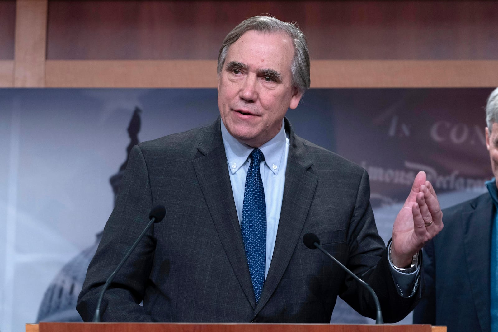 Sen. Jeff Merkley, D-Ore., speaks during a news conference on Russ Vought's nomination at the Capitol in Washington, Thursday, Jan. 30, 2025. (AP Photo/Jose Luis Magana)