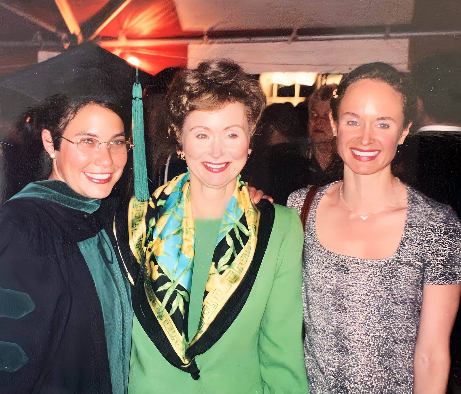 Raske (L) at her graduation from medical school in 2001. She is shown with her aunt Dr. Susan Laessig (middle) and cousin, Dr. Katherine Laessig (R) both of whom inspired her to go to medical school.