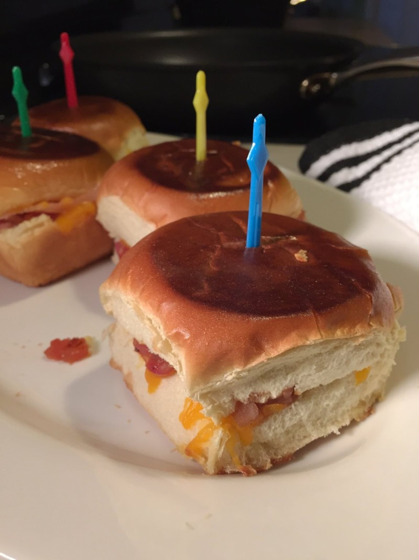 You’ll be the Super Bowl Party Food Champ with these Grilled Cheese Sliders with Pancetta and Tomato Marmalade. CONNIE POST/STAFF