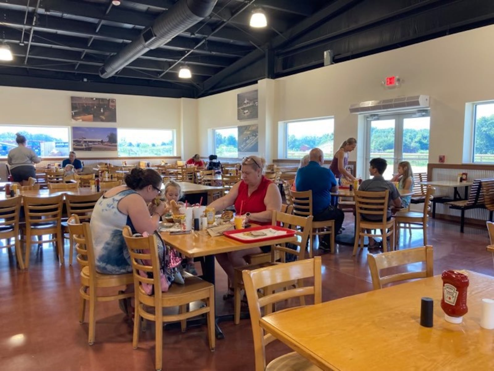 A steady stream of early customers began at 10 a.m. on Aug. 26, 2021 inside the new Young's Jersey Dairy facility situated directly behind what has been the dairy barn just outside of Yellow Springs since 1968.