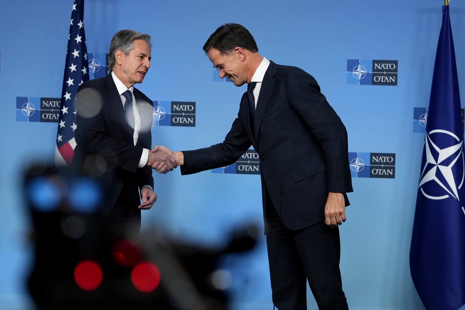 NATO Secretary General Mark Rutte, right, shakes hands with United States Secretary of State Antony Blinken during a meeting of NATO foreign ministers at NATO headquarters in Brussels,Tuesday, Dec. 3, 2024. (AP Photo/Virginia Mayo)