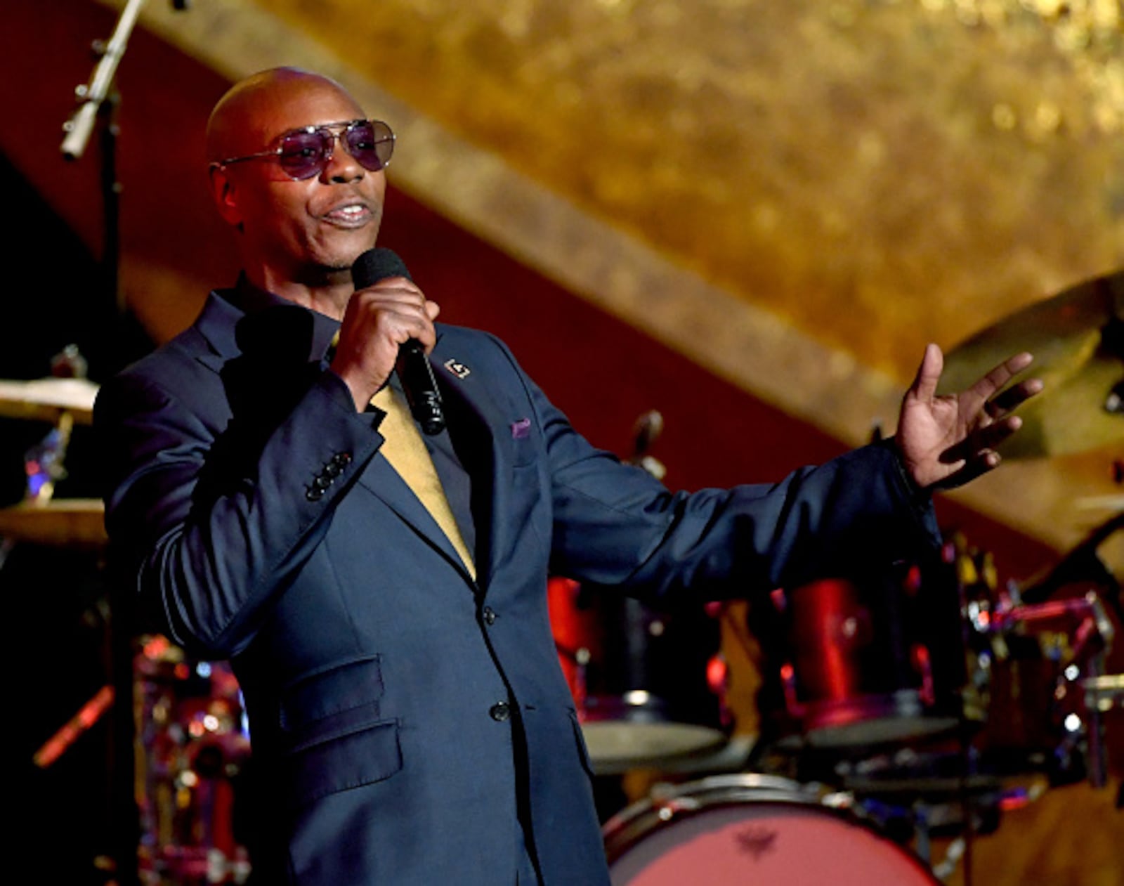 LOS ANGELES, CA - SEPTEMBER 25:  Dave Chappelle speaks onstage at Q85: A Musical Celebration for Quincy Jones at the Microsoft Theatre on September 25, 2018 in Los Angeles, California.  (Photo by Kevin Winter/Getty Images)