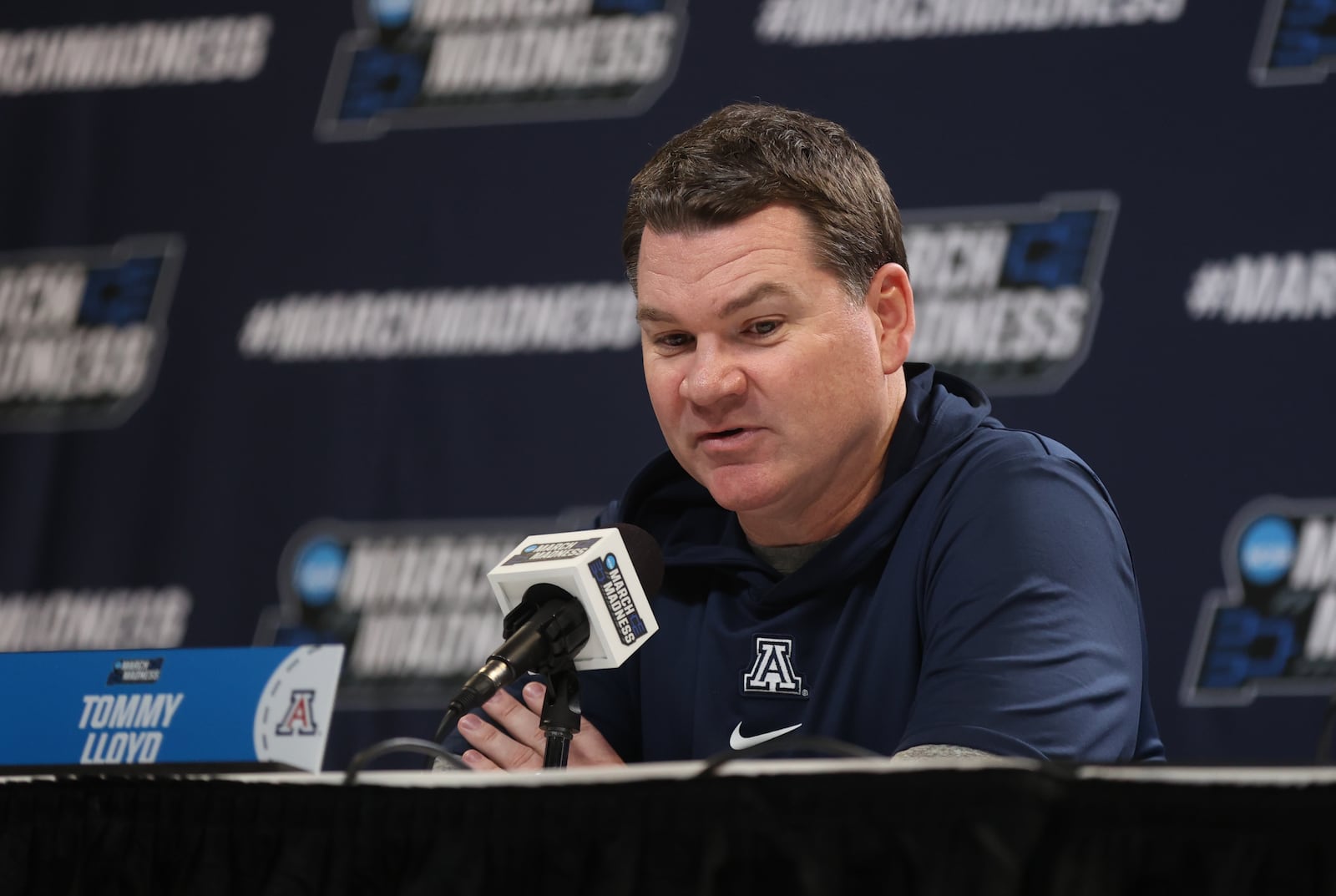 Arizona's Tommy Lloyd speaks at a press conference on Friday, March 22, 2024, at the Delta Center in Salt Lake City, Utah. David Jablonski/Staff