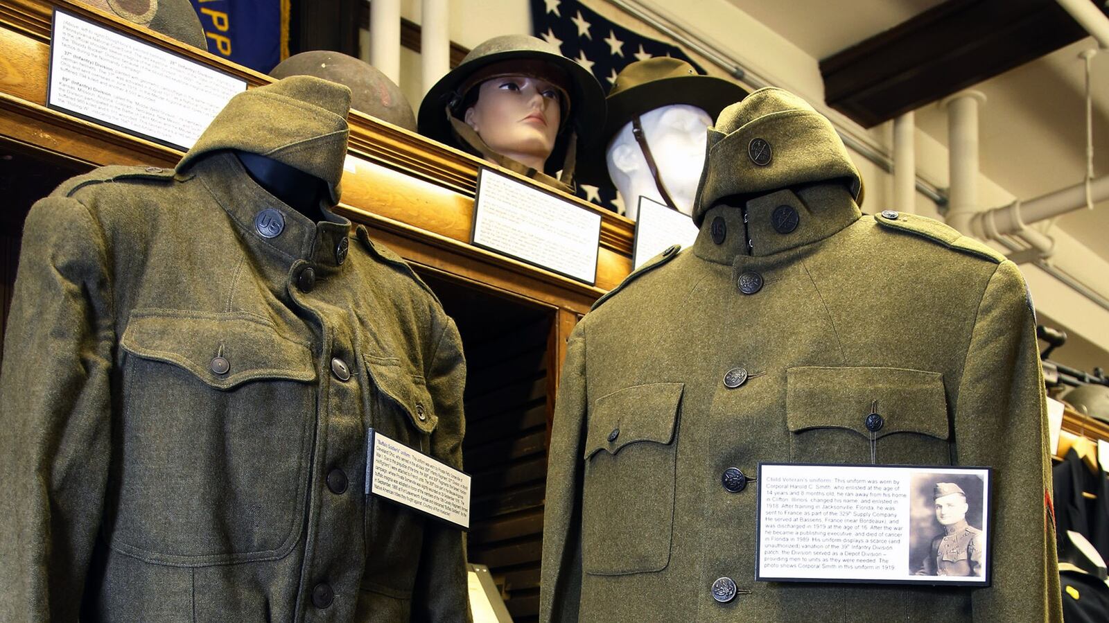 World War I uniforms at the Miami Valley Military History Museum located in Building 120 on the Dayton Veterans Administration campus. The uniform at right was worn by Corporal Harold C. Smith from Clifton, Illinois. Smith ran away from home at age 14, changed his name and enlisted in the Army. He was served in France and was discharged in 1919 at age 16. TY GREENLEES / STAFF