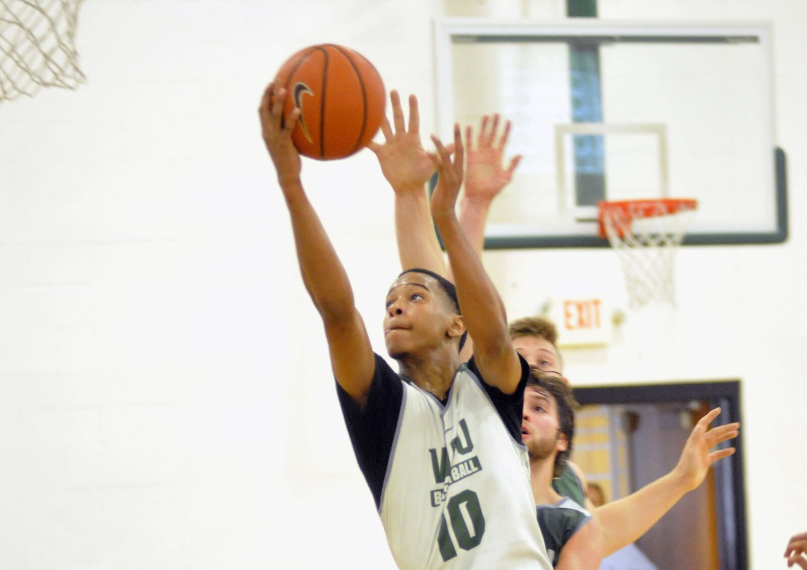 Wright State freshman Jaylon Hall drives to the basket during summer practice Thursday at the Setzer Pavilion.