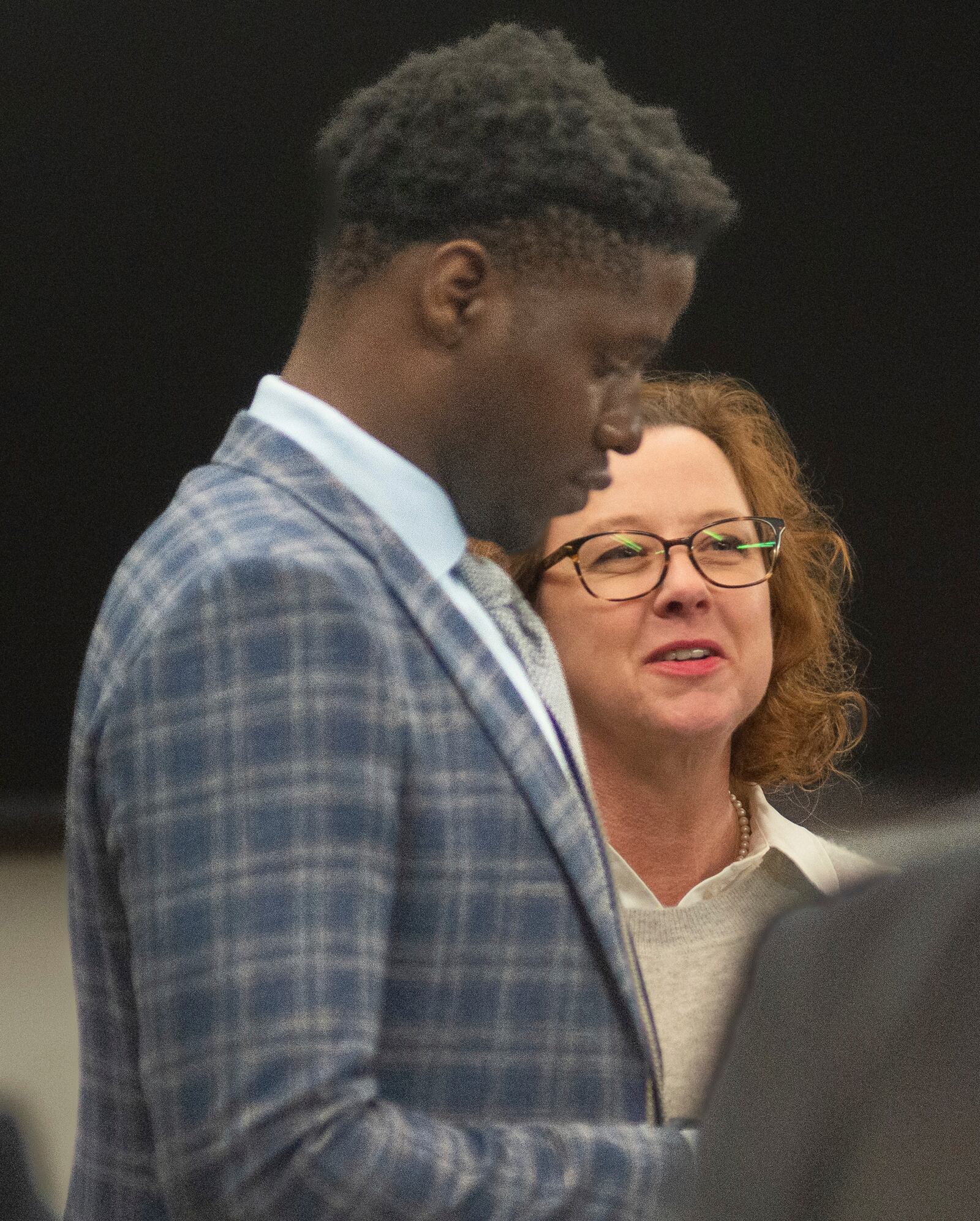 Former Brunswick Circuit District Attorney Jackie Johnson finally manages a smile after waiting somberly to leave the courtroom after trial Judge John R. Turner granted a defense motion dismissing the only remaining charge against her, one of violating her oath of office, Wednesday, Feb. 5, 2025, in Brunswick, Ga. (Terry Dickson/The Brunswick News via AP, Pool)