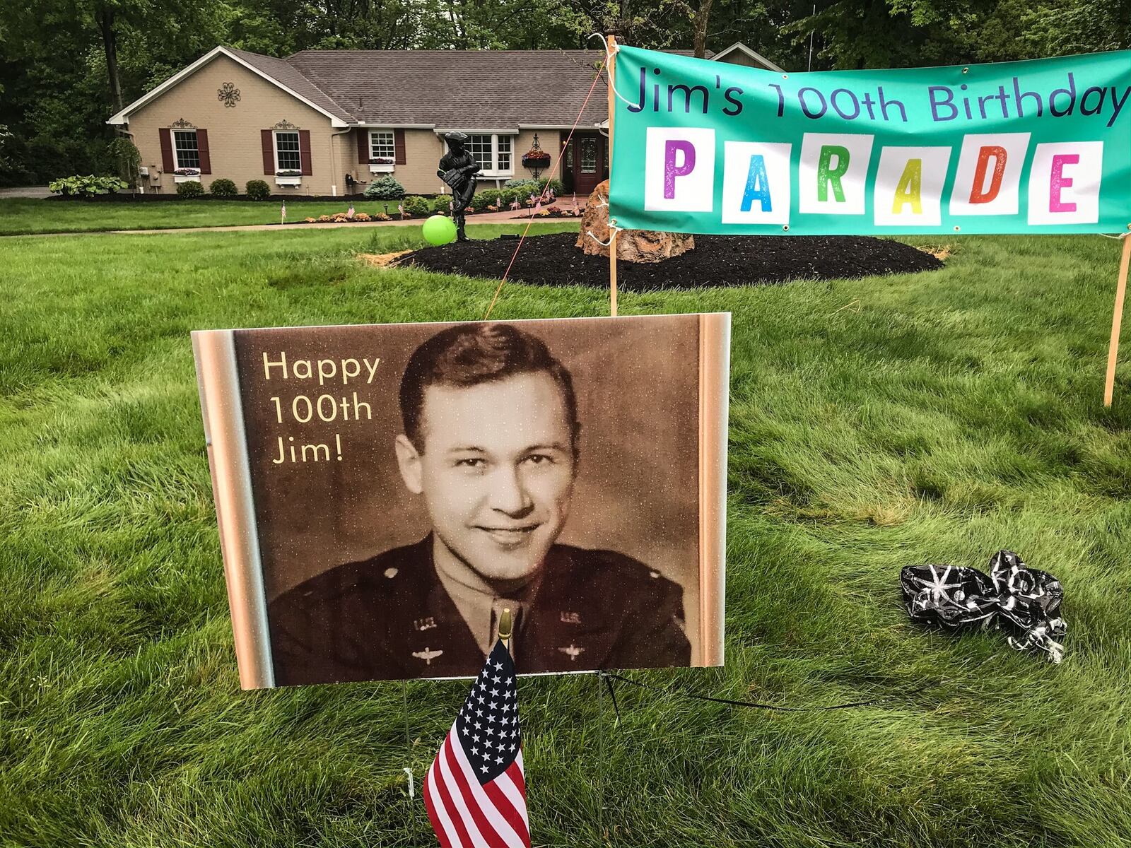 The coronavirus pandemic means that Jim Taylor's 100th birthday party had to be put on hold, but friends and neighbors celebrated the World War II veteran's milestone with a caravan Monday, May 18, 2020. JIM NOELKER / STAFF