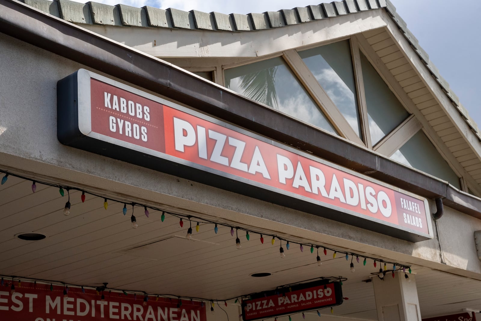 Pizza Paradiso is pictured, Monday, Nov. 18, 2024, in Lahaina, Hawaii. Pizza Paradiso will be one of the food vendors for the Maui Invitational. (AP Photo/Mengshin Lin)