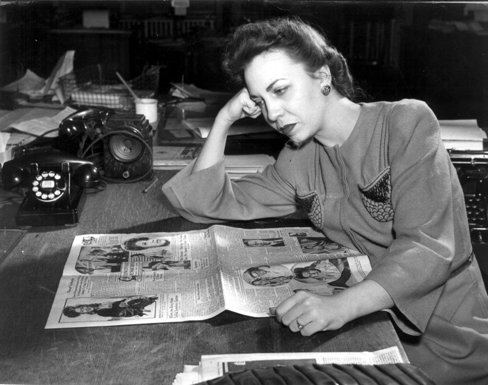 Betty Dietz Krebs looks over the women's pages at the Dayton Daily News in the 1950's.