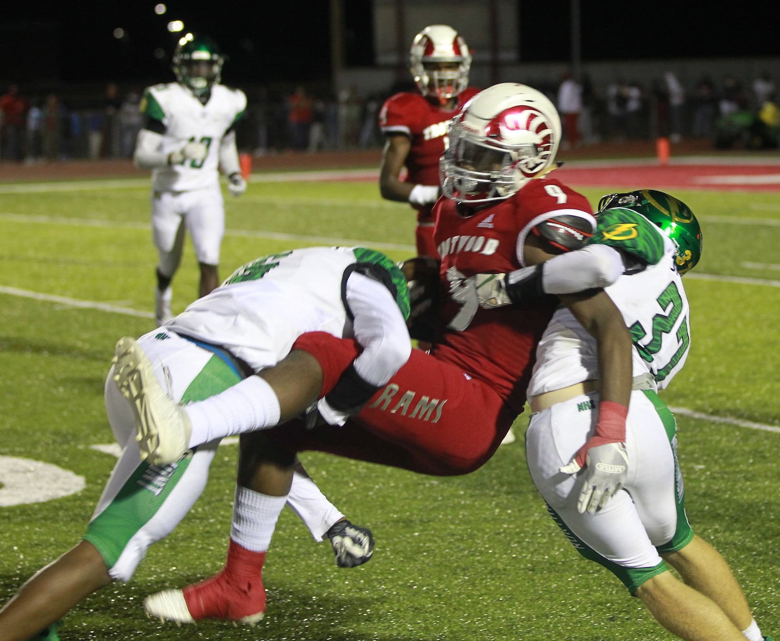 Terence Wright (left) and Zach Martin (37) upend Daylon Morgan of Trotwood-Madison. Trotwood defeated visiting Northmont 20-14 in a Week 5 high school football game on Friday, Sept. 27, 2019. MARC PENDLETON / STAFF