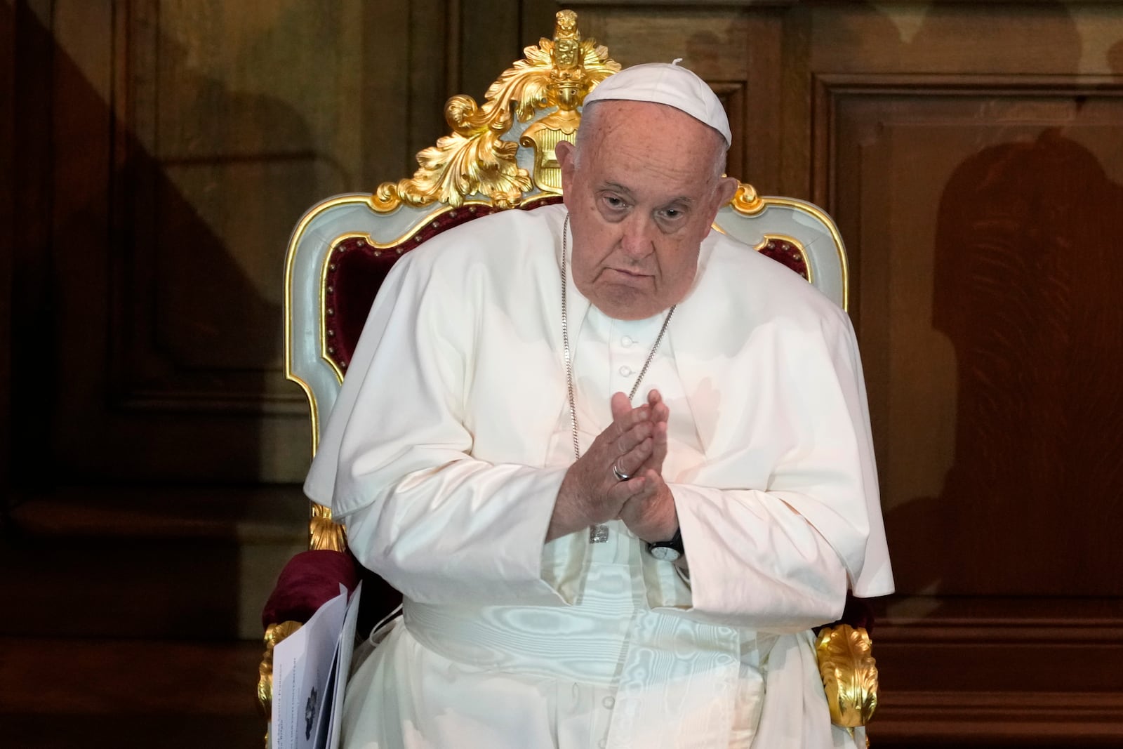 Pope Francis attends a meeting with the professors in the Promotiezaal of the Catholic University of Leuven, Belgium, Friday, Sept. 27, 2024. (AP Photo/Andrew Medichini)