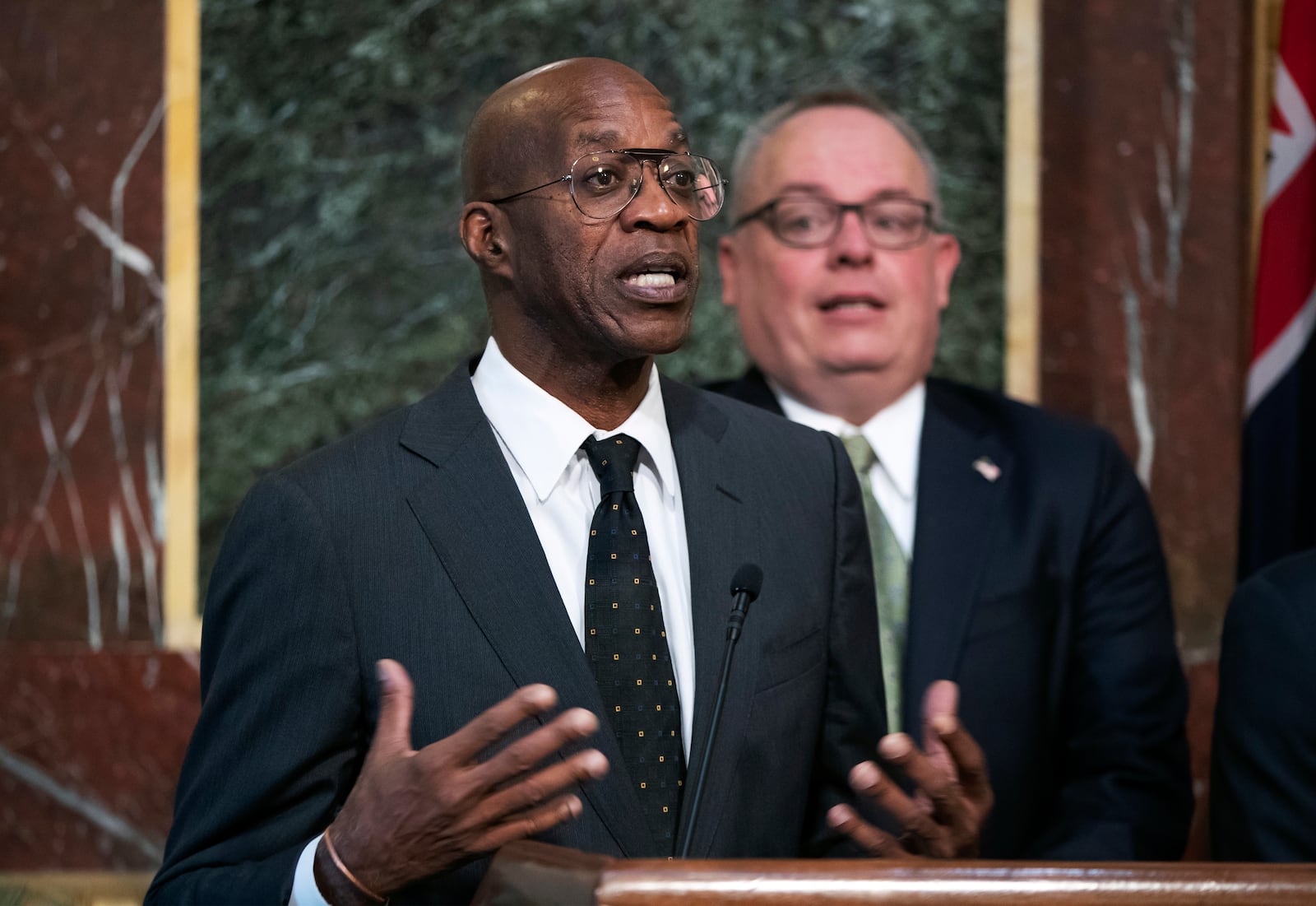 FILE - Edwin Moses, chairman of the U.S. Anti-Doping Agency, speaks at a news conference during a White House event aimed at reforming the World Anti-Doping Agency, in Washington on Oct. 31, 2018. Moses, the American gold-medal hurdler who had a key role in sorting through the Russian scandals, recalled trying to explain Moscow's point of view to anti-doping leaders. "One thing I was always trying to get across to them was, 'You don't understand how important sports are to them,'" Moses said. (AP Photo/J. Scott Applewhite, File)