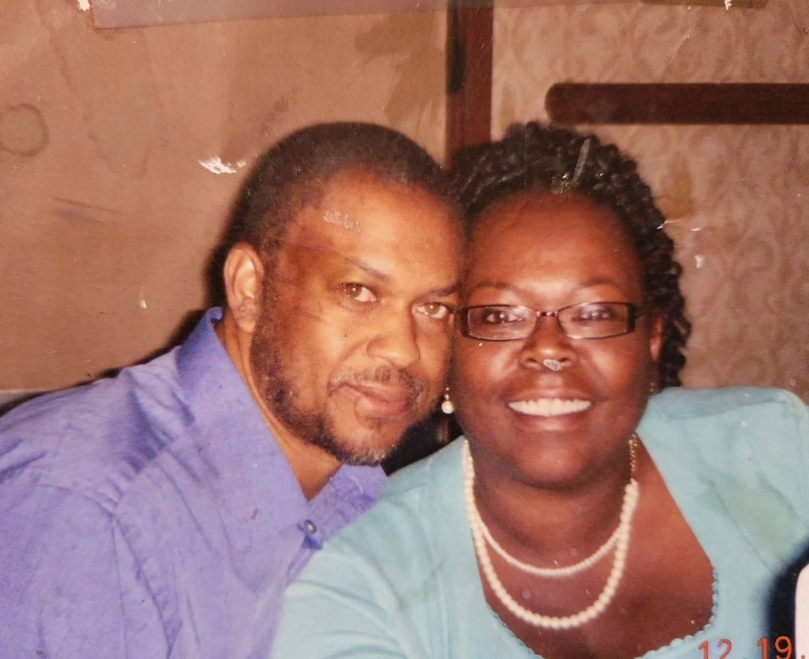 This photo courtesy of Kiriski Mitchell shows her brother Anthony Mitchell, left, with his late wife, Anita Mitchell, in an Altadena in 2019. Anthony Mitchell, and his son Justin, died in California's deadly wildfires in January 2025. (Kiriski Mitchell via AP)