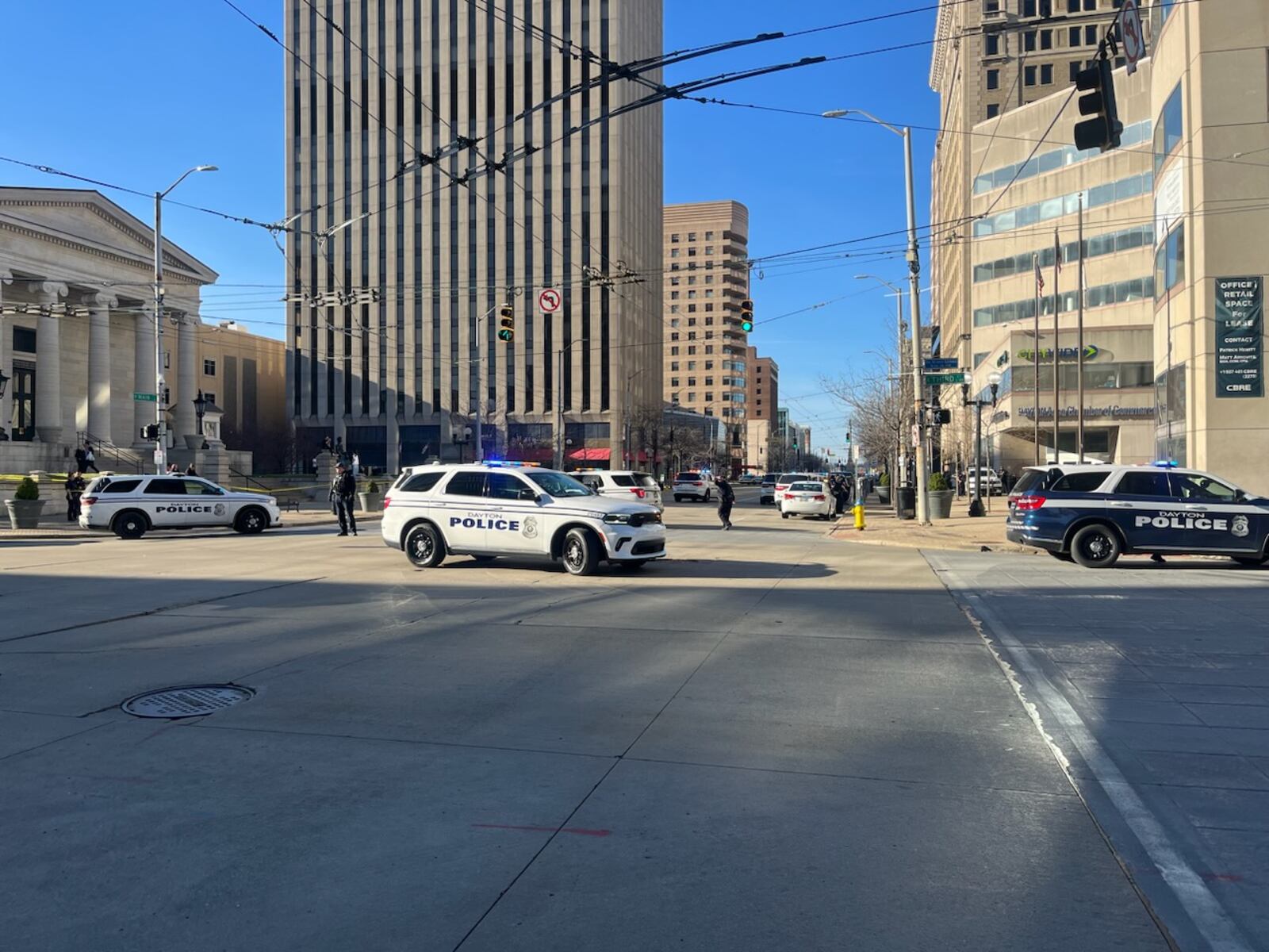 A standoff taking place late afternoon Sunday, March 3, in downtown Dayton. The standoff is reportedly taking place on Main Street between Third and Second streets. A large police presence has surrounded the scene as officers continue to shut down additional streets. CORY FROLIK/STAFF