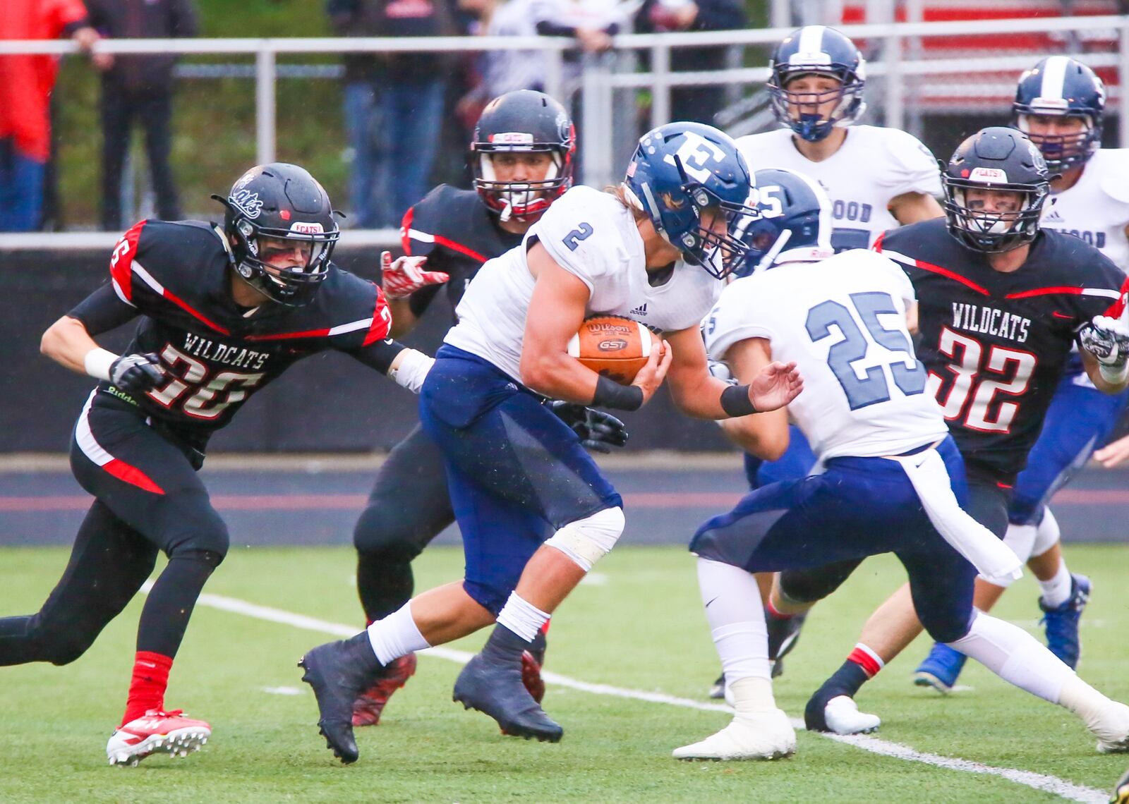 Edgewood kick returner D.J. Whiles (2) avoids a tackle on a first-quarter return during Friday night’s game against Franklin at Atrium Stadium in Franklin. GREG LYNCH/STAFF