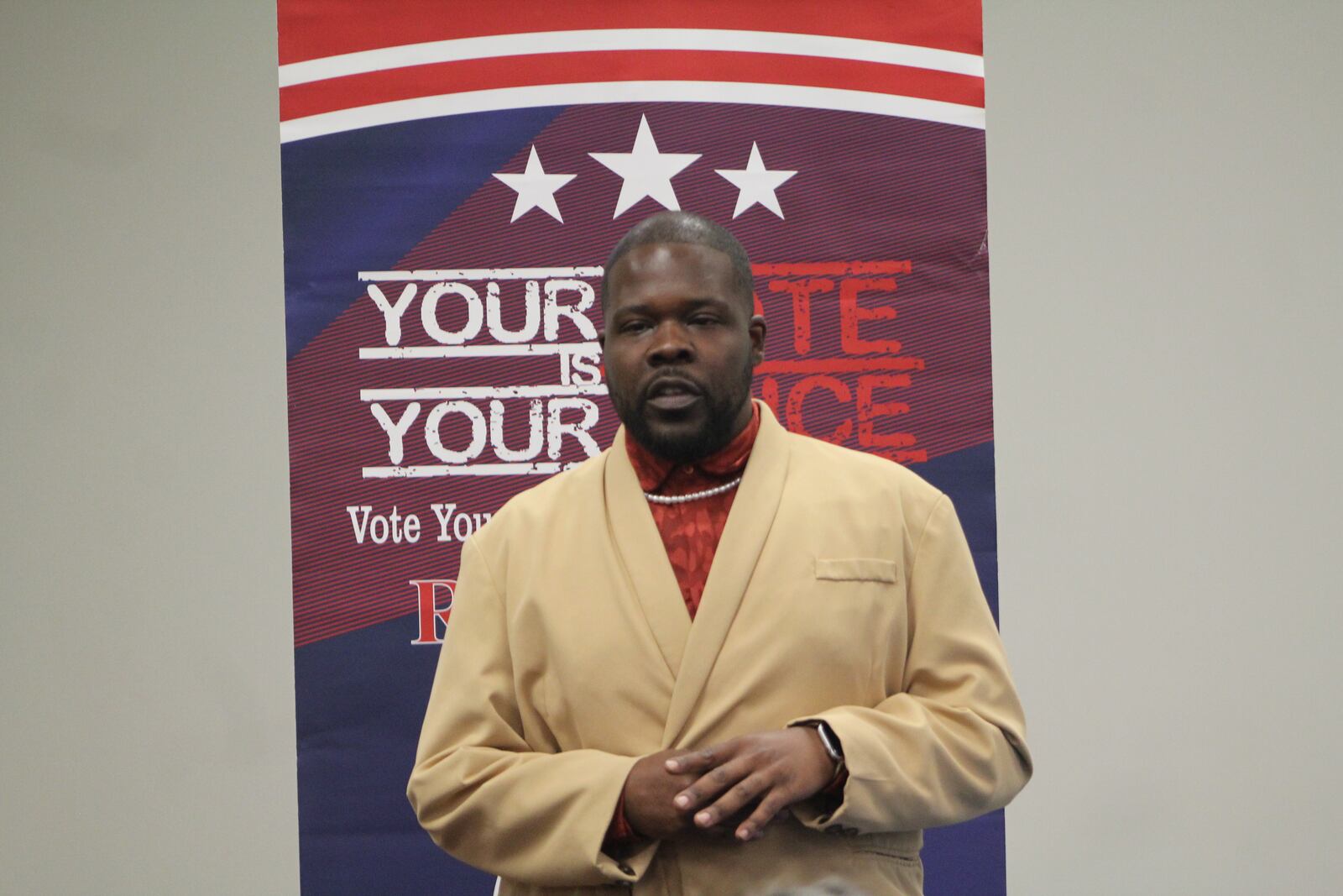 Marcus Bedinger, a Dayton city commission candidate, speaks at a candidate forum hosted by the Dayton Unit NAACP. CORNELIUS FROLIK / STAFF