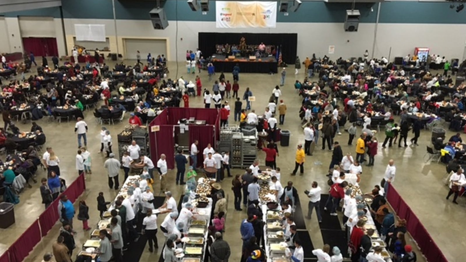 Thousands gathered for the annual Feast of Giving on Thanksgiving Day at the Dayton Convention Center. BARRIE BARBER/STAFF