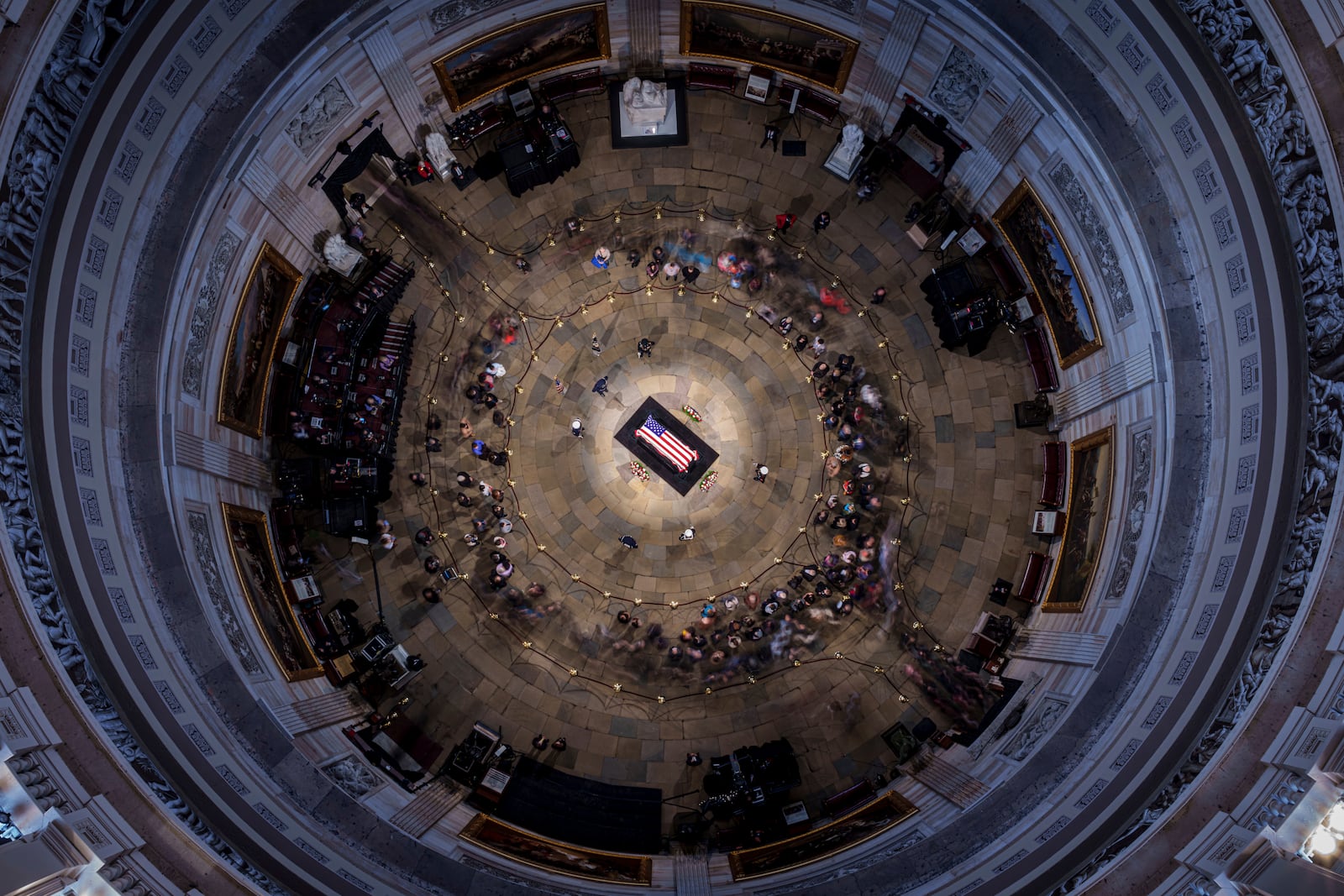 The flag-draped casket of former President Jimmy Carter lies in state at the rotunda of the U.S. Capitol, Wednesday, Jan. 8, 2025, in Washington. (Andrew Harnik/Pool via AP)