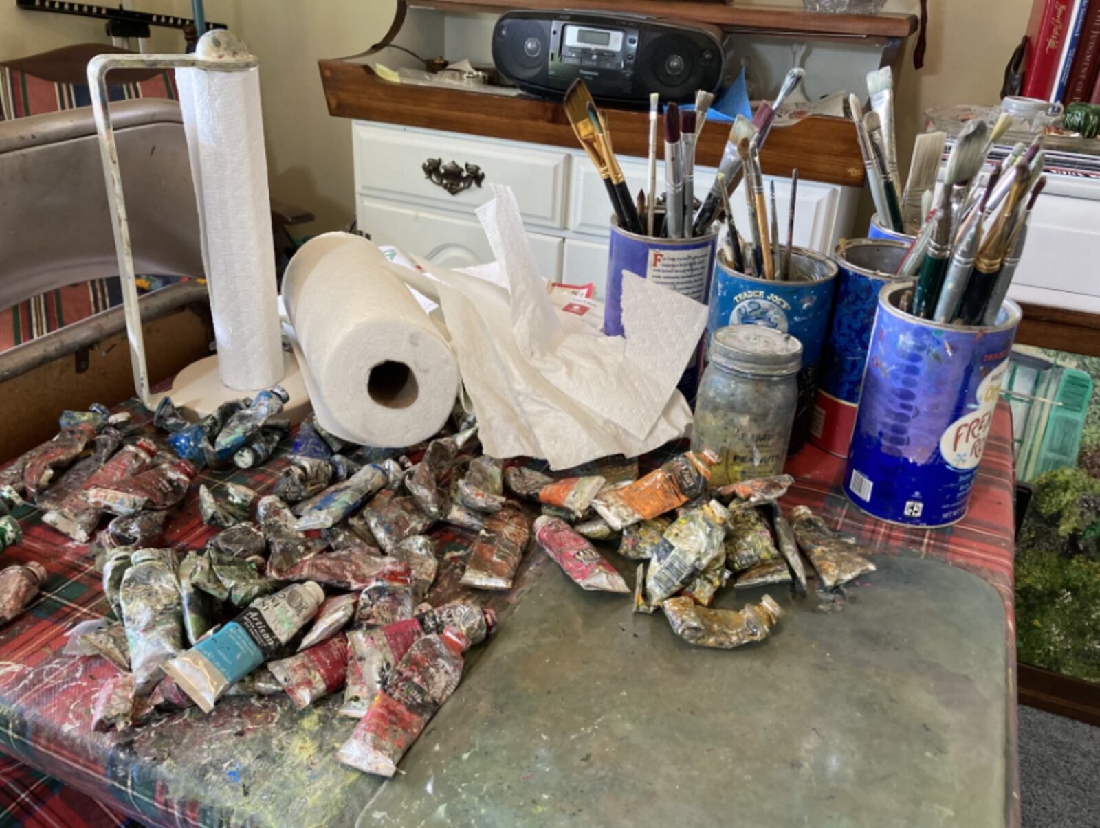 At 98-years-old, Southwest Ohio resident James Noyes is still painting and teaching others. Shown here are some of his paints and brushes. CONTRIBUTED