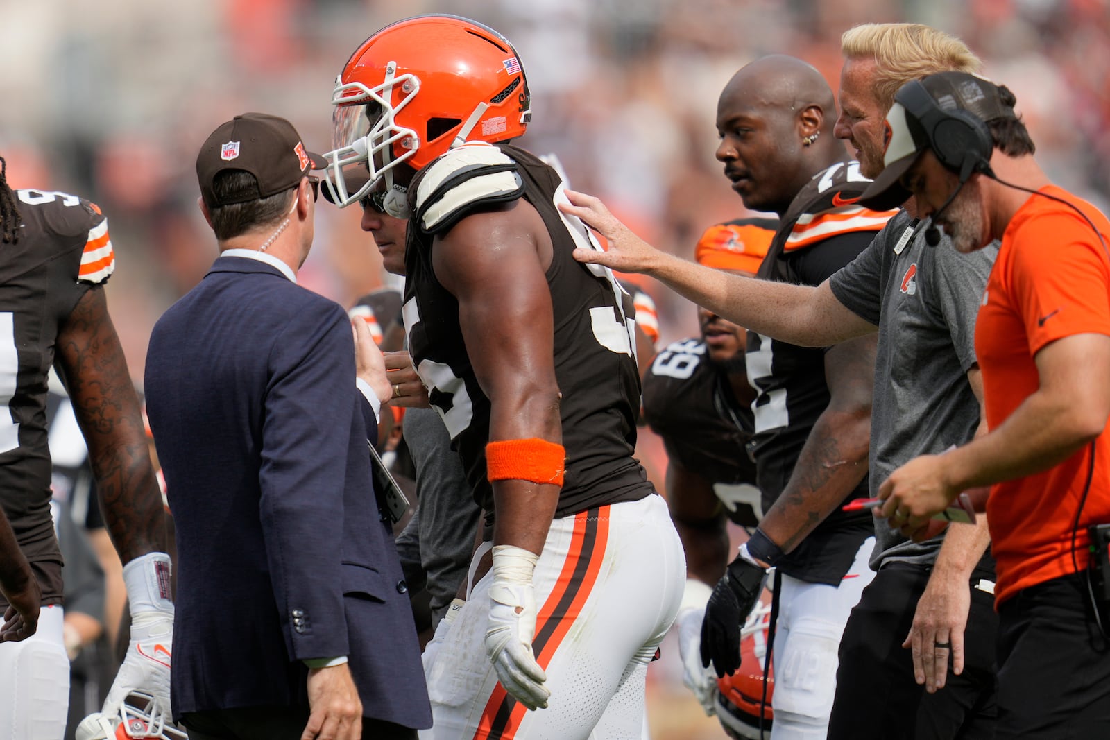 Cleveland Browns' Myles Garrett is helped off the field after an injury in the second half of an NFL football game against the New York Giants, Sunday, Sept. 22, 2024, in Cleveland. (AP Photo/Sue Ogrocki)