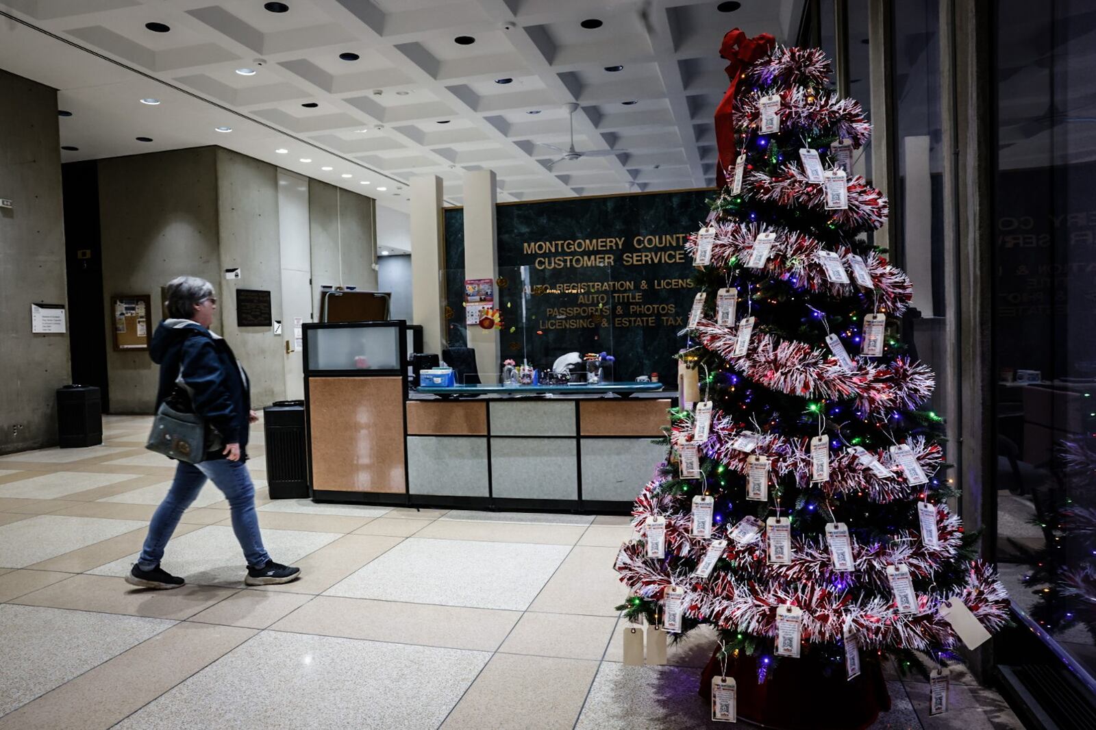 The holiday giving tree in the Montgomery County Administration Building on West Third Street is up. This tree has tag ornaments that contain the info of people living at Stillwater Center, which is a care facility for people with disabilities or long-term illness. JIM NOELKER/STAFF