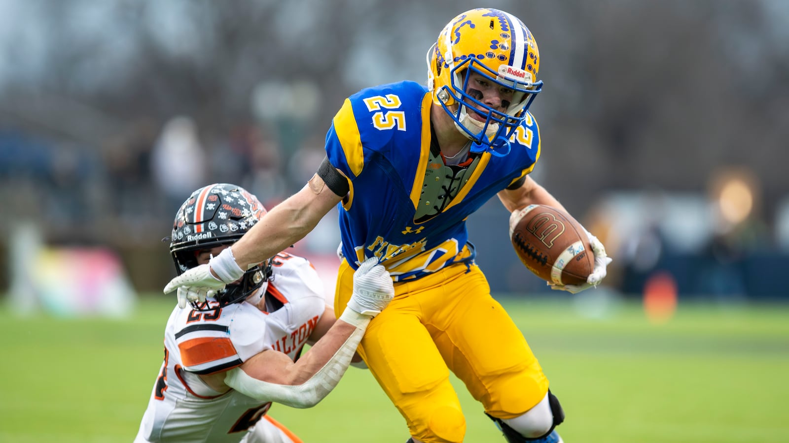 Cutline: Marion Local High School senior running back Kyle Otte is tackled by Dalton senior Greyson Siders during the Division VII state championship game on Saturday morning at Tom Benson Hall of Fame Stadium in Canton. The Flyers won their third straight state title, beating the Bulldogs 38-0. Michael Cooper/CONTRIBUTED