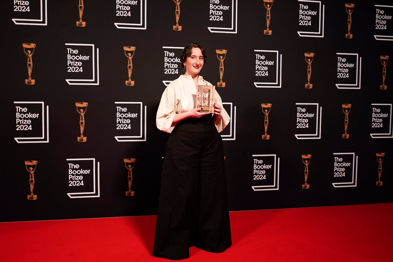 Yael Van Der Wouden arrives at the Booker Prize award dinner in London, Tuesday, Nov. 12, 2024. (AP Photo/Alberto Pezzali)