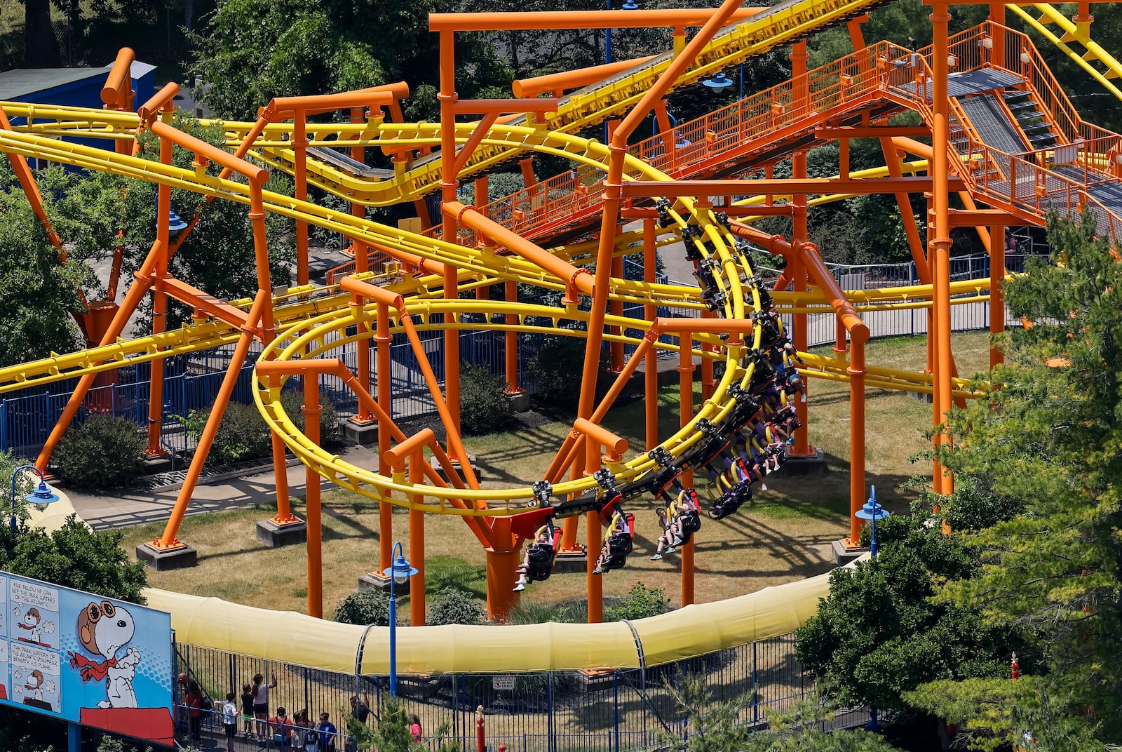 Kings Island visitors ride Flying Ace Aerial Chase coaster Friday, June 9, 2023 in Mason. NICK GRAHAM/STAFF