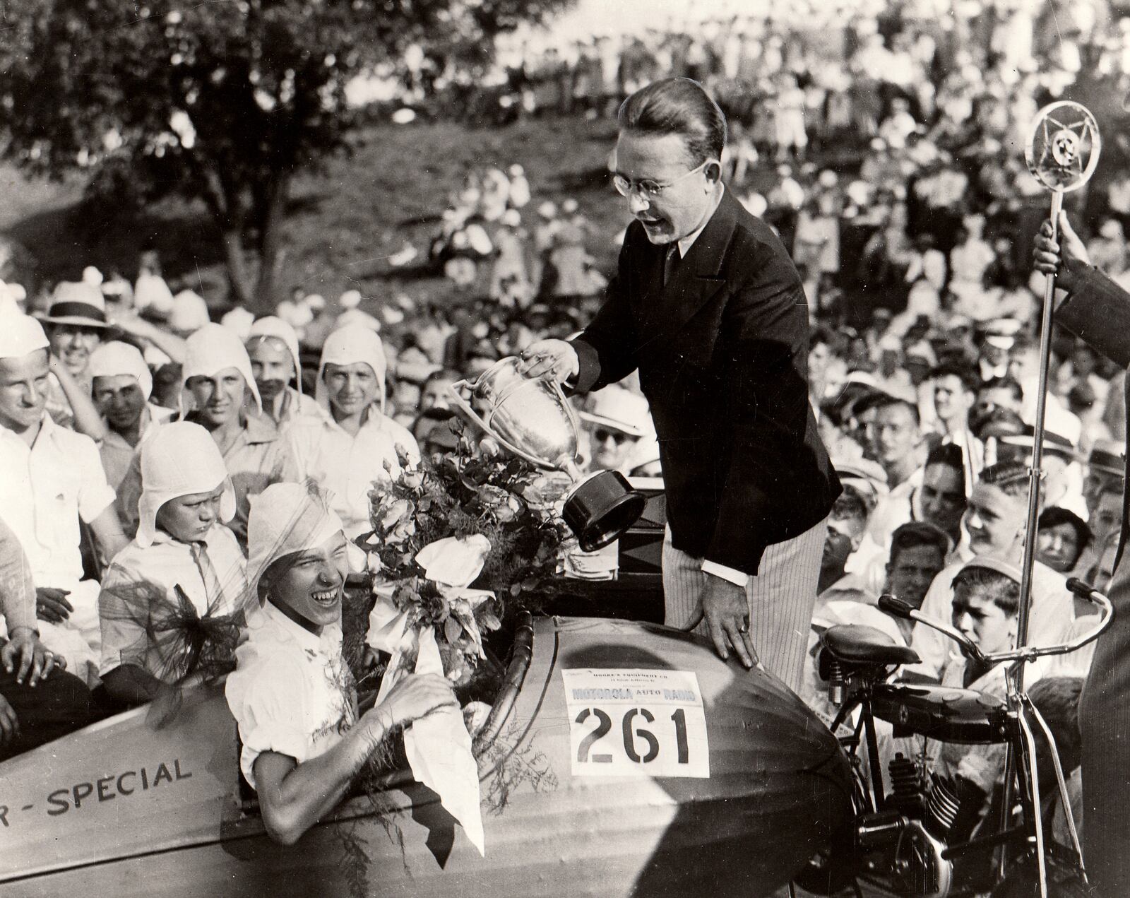 Myron E. Scottie Scott was a Dayton Daily News photographer in 1933 when he came across of group of boys racing homemade coasters. That chance meeting turned into the very first Soap Box Derby race. Its estimated more than 40,000 people lined Burkhardt Avenue for the event. The young faces watching Scottie award the inaugural loving cup sum up the excitement of that day. DAYTON DAILY NEWS ARCHIVE