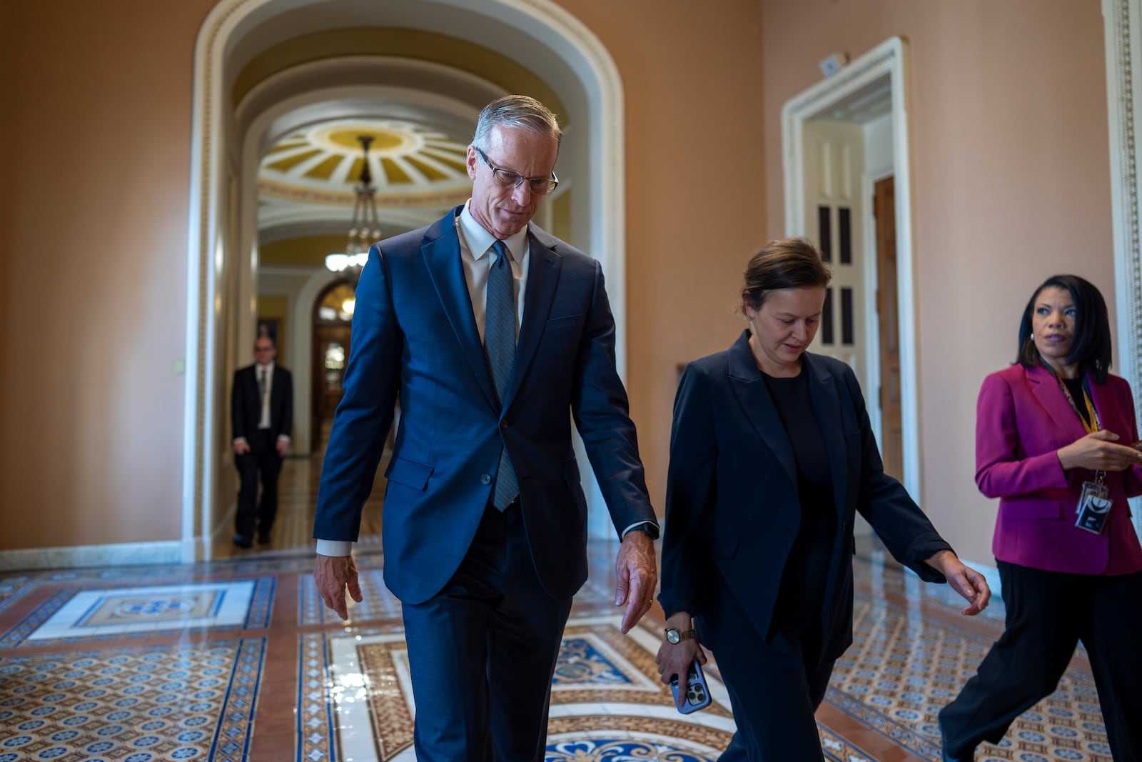 Senate Majority Leader John Thune, R-S.D., walks from the chamber to his office at the Capitol in Washington, Thursday, Feb. 20, 2025. (AP Photo/J. Scott Applewhite)