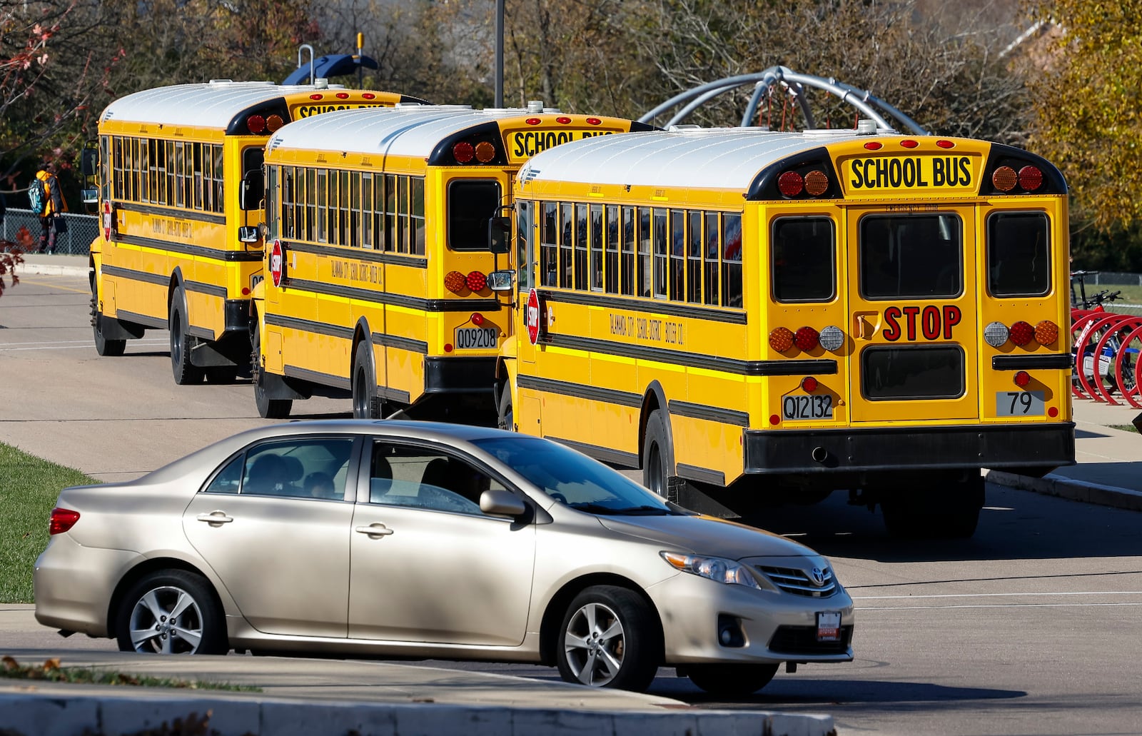 Buses arrive to pick up students from Kramer Elementary School in Oxford. NICK GRAHAMSTAFF 