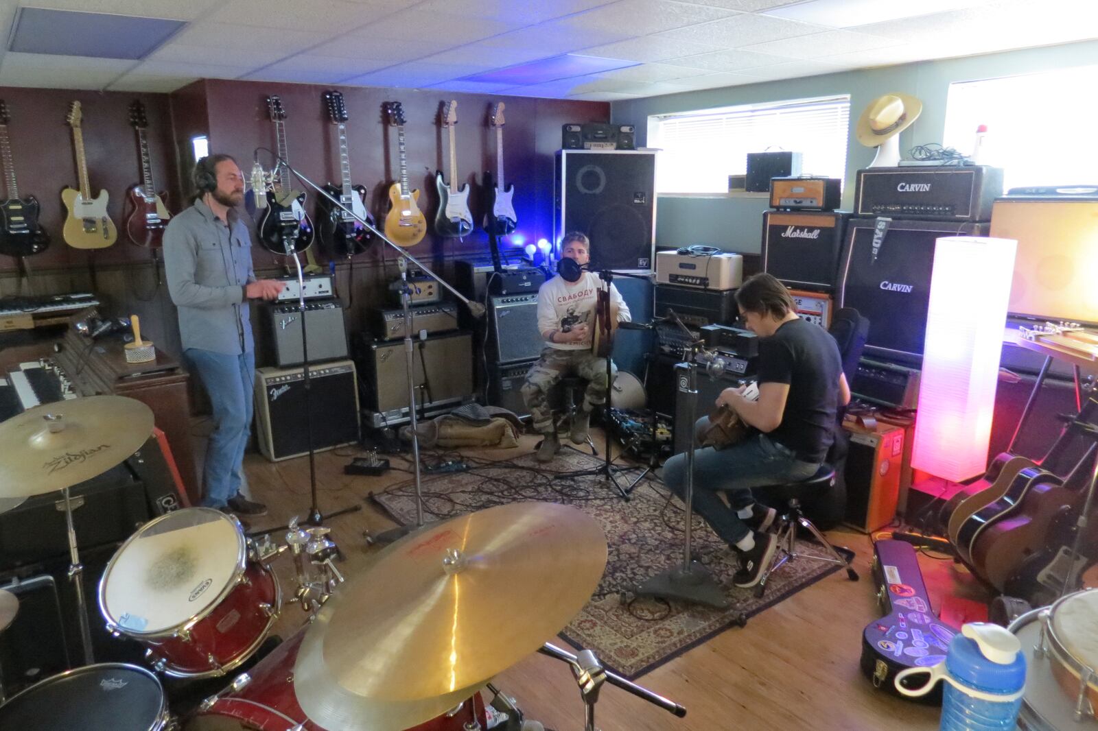 Slavalachia members (left to right) Benya Stewart, Brett Hill and Siarzhuk Douhushau, recording a new compilation album at Reel Love Recording Company, will perform at a Benefit for Ukraine at Sueño in Dayton on Sunday, April 24.