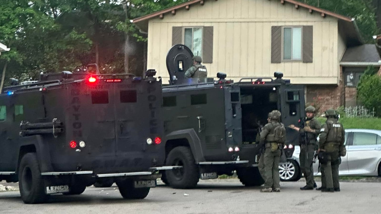 SWAT crews were on scene Sunday morning, May 5, 2024, on Kings Cross Court in West Carrollton for a man yelling out his door who reportedly made threats to shoot police. Karen Korn/CONTRIBUTED