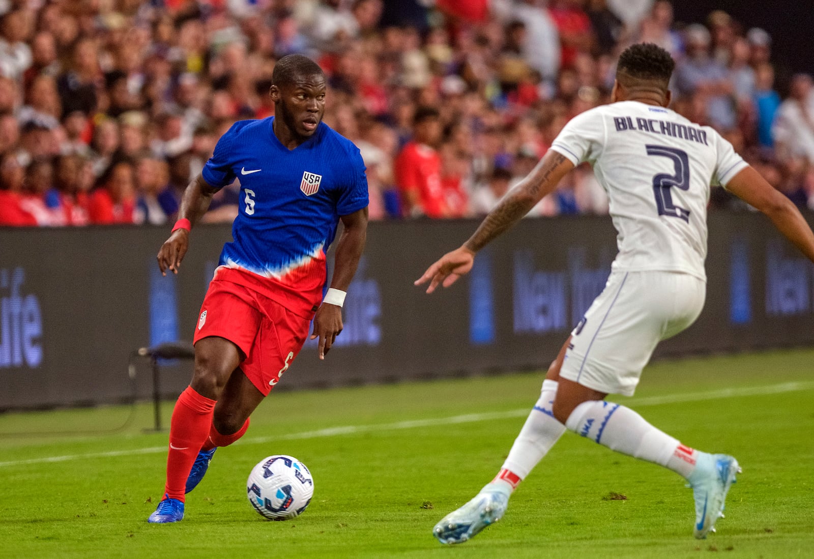 United States midfielder Yunus Musah, left, takes on Panama defender Austin Trusty (2) during the first half of an international friendly soccer match, Saturday, Oct. 12, 2024, in Austin, Texas. (AP Photo/Rodolfo Gonzalez)