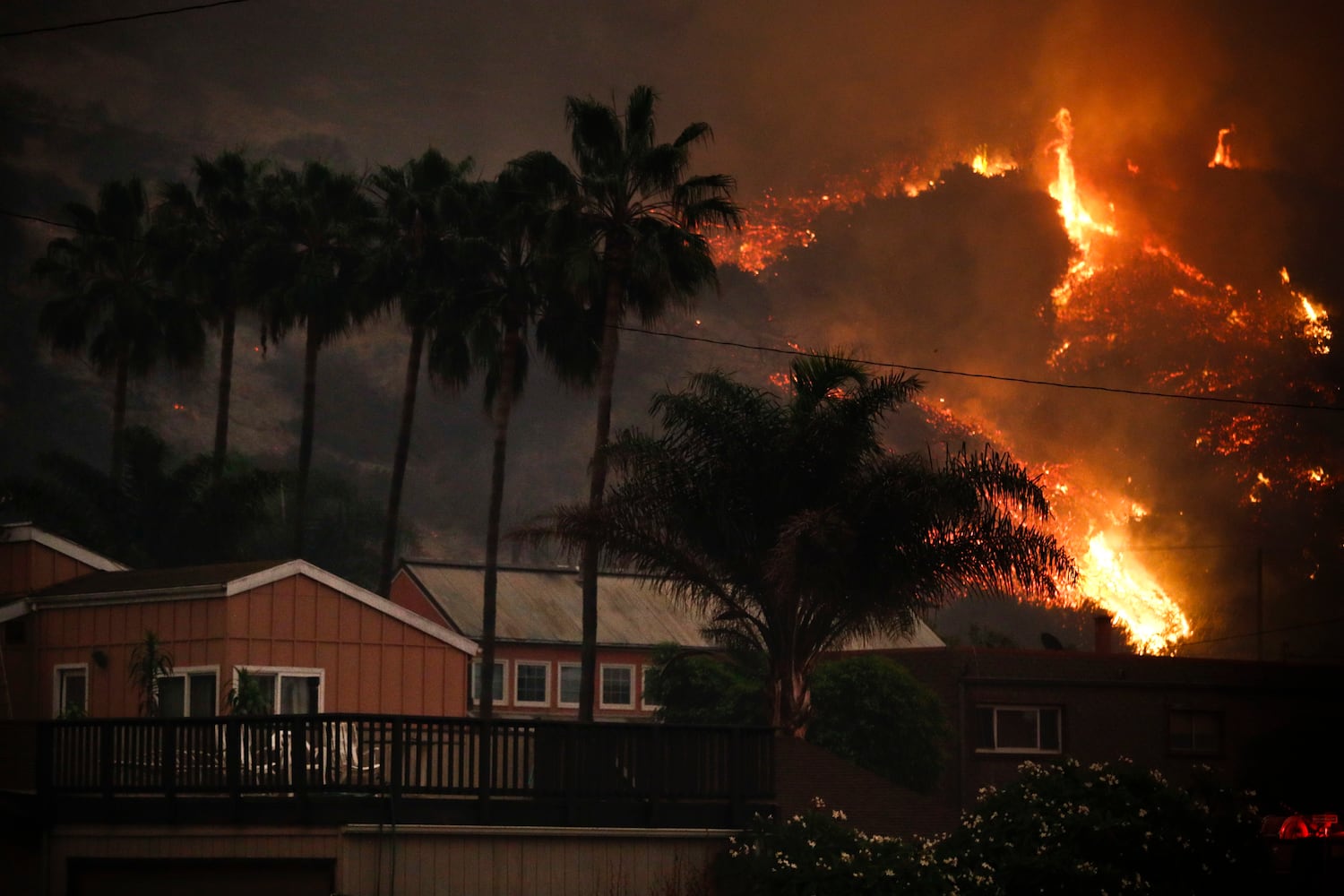 Photos: California wildfires burn thousands of acres, force evacuations