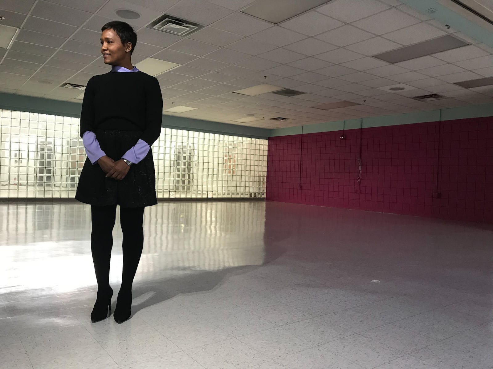 YWCA president and CEO, Shannon Isom stand in a new space that is 20,000-square-foot administration building in Huber Heights. JIM NOEKLER/STAFF