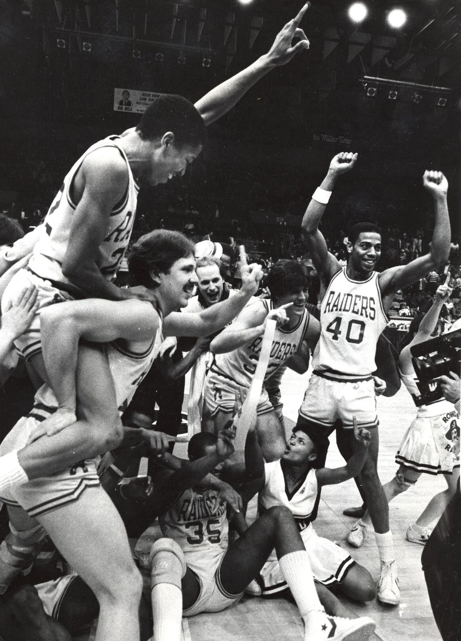 The Wright State University Raiders celebrate the Division II National Championship in 1983. They beat the University of the District of Columbia 92-73. DAYTON DAILY NEWS ARCHIVE