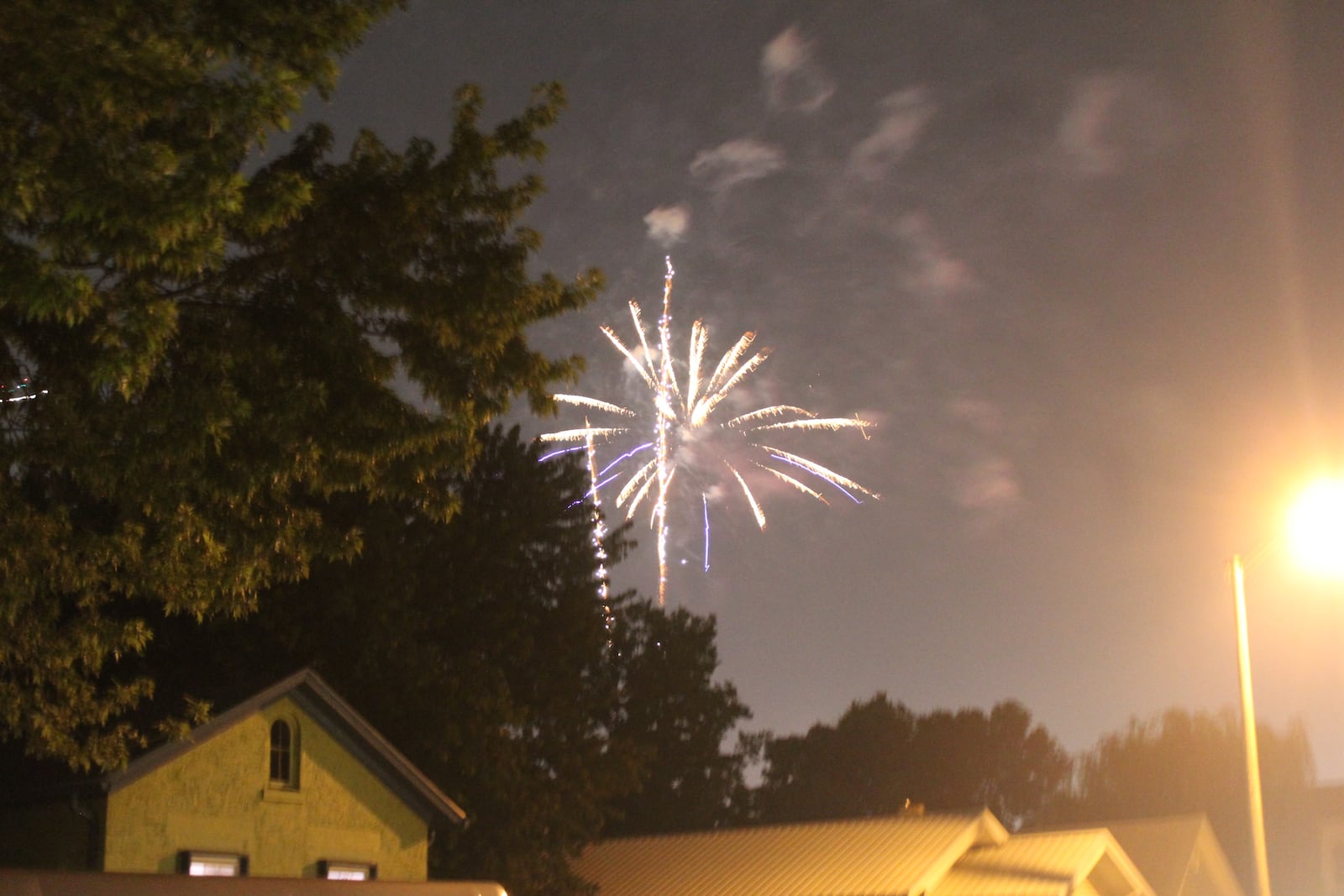 Fireworks go off in the city of Dayton on Sunday, July 4. Cornelius Frolik / Staff