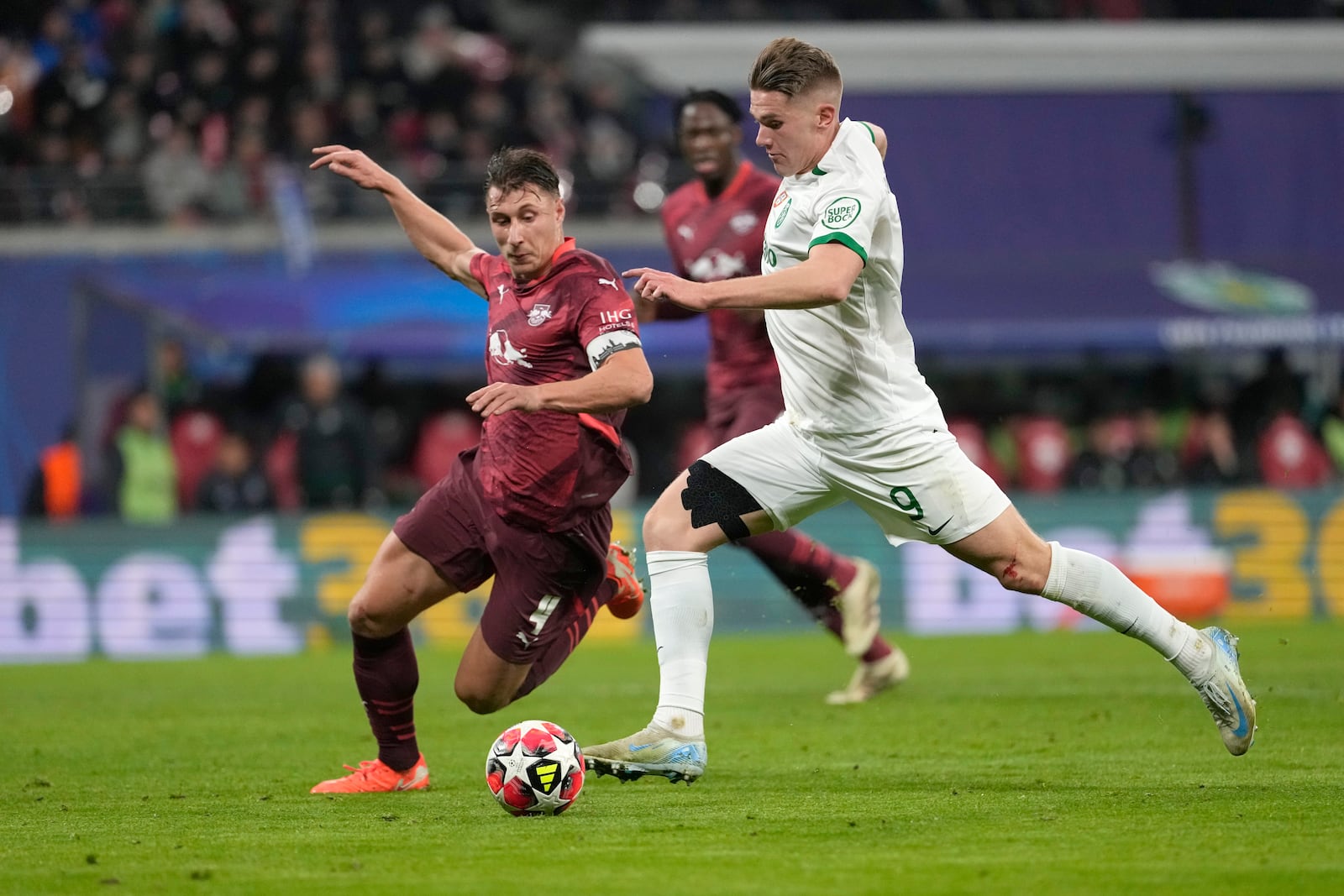 Sporting's Viktor Gyoekeres scores his side's opening goal during the Champions League soccer match between RB Leipzig and Sporting CP at the RB Arena in Leipzig, Germany, Wednesday, Jan. 22, 2025. (AP Photo/Matthias Schrader)