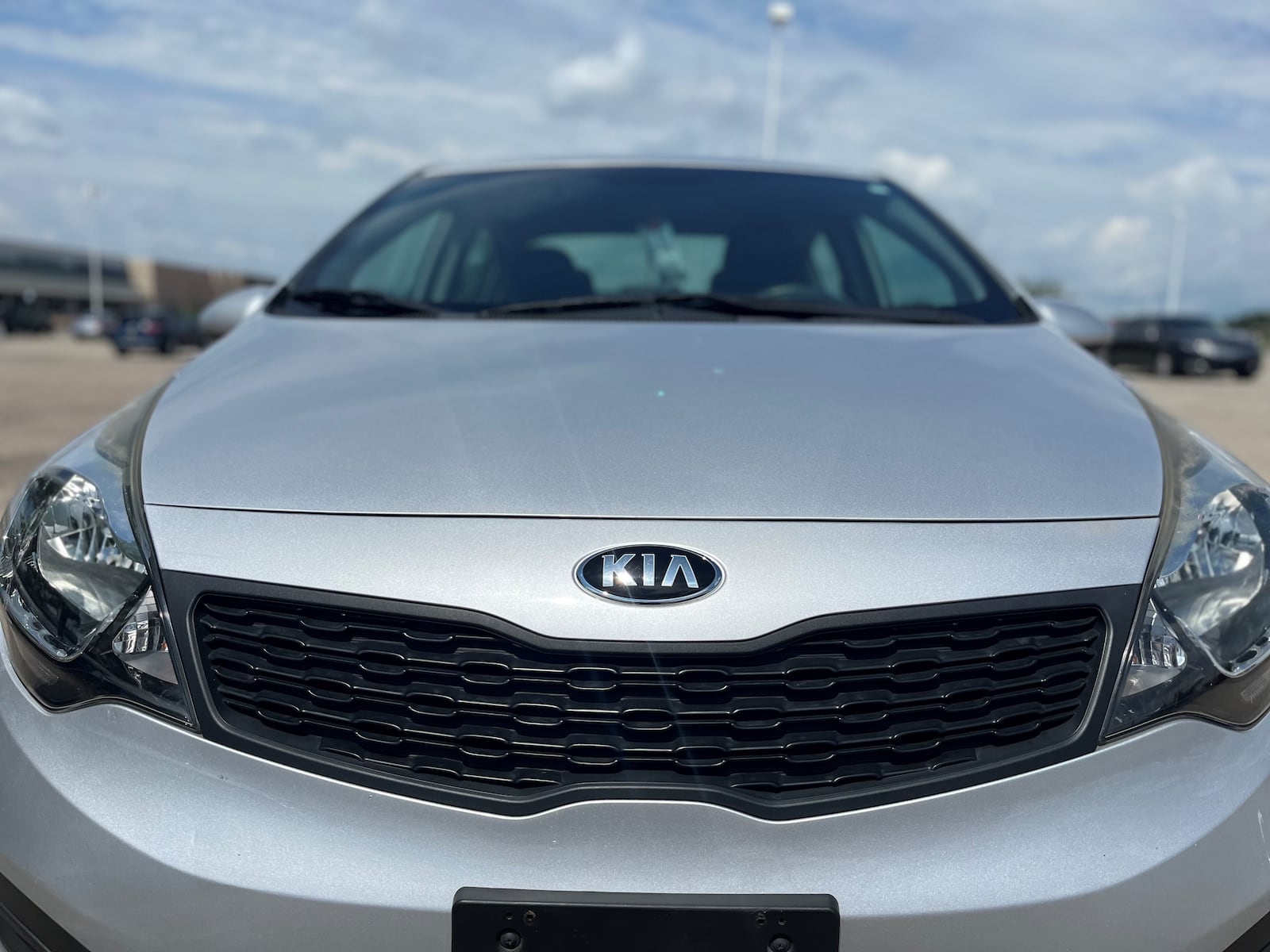 A Kia parked in a lot of a local shopping plaza. CORNELIUS FROLIK / STAFF