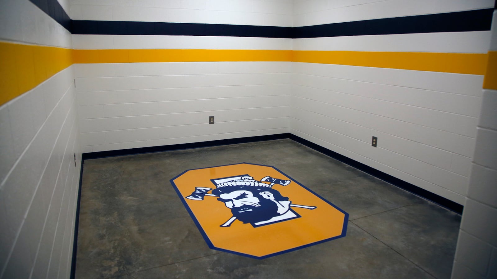 For the first time in school history, Oakwood High School will now have a dedicated sports facility to accommodate soccer, field hockey, boys and girls lacrosse and track. This is one of the two team rooms in the concessions building at Oakwood's Lane Stadium.  TY GREENLEES / STAFF