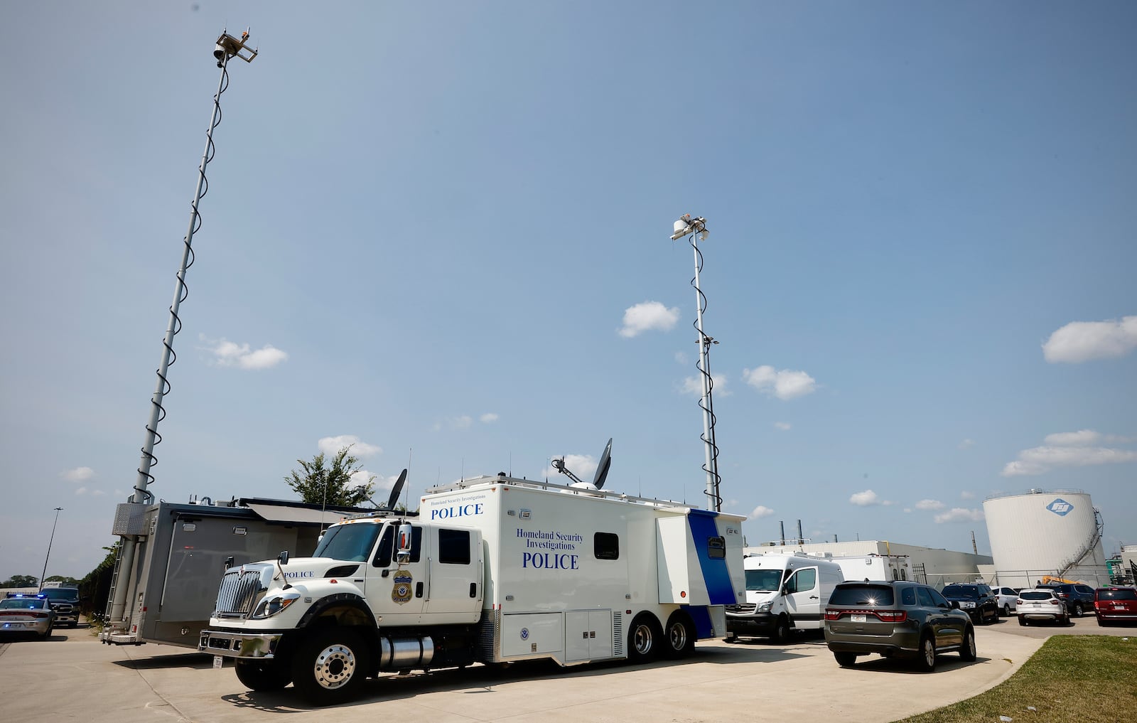 Homeland Security Investigations vehicles were at Fuyao Glass America Friday, July 26, 2024, as part of an investigation into allegations of financial crimes and labor exploitation. Search warrants were also served at 27 other locations in the Dayton-area as part of the investigation. MARSHALL GORBY \STAFF