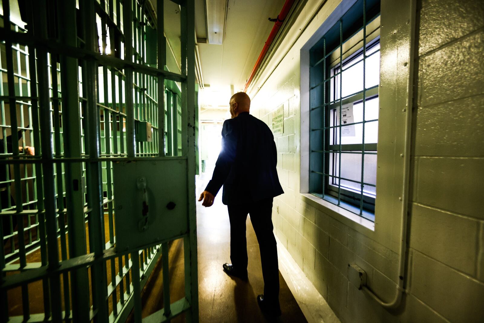 Greene County Police Major Kirk Keller walks through the third story of the Greene County Jail. The jail was built in the 1960s and Keller hopes Greene County residence will pass a sales tax to replace the aging building. JIM NOELKER/STAFF