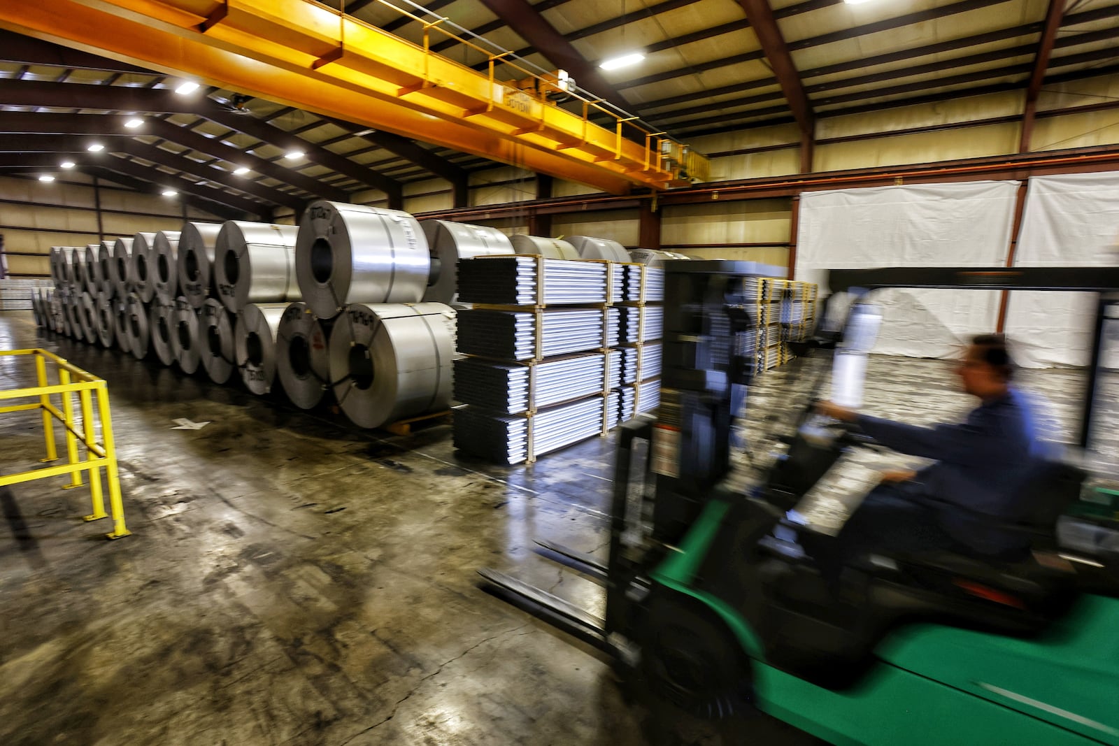 Tubes and coils of steel are moved into place. NICK GRAHAM/STAFF