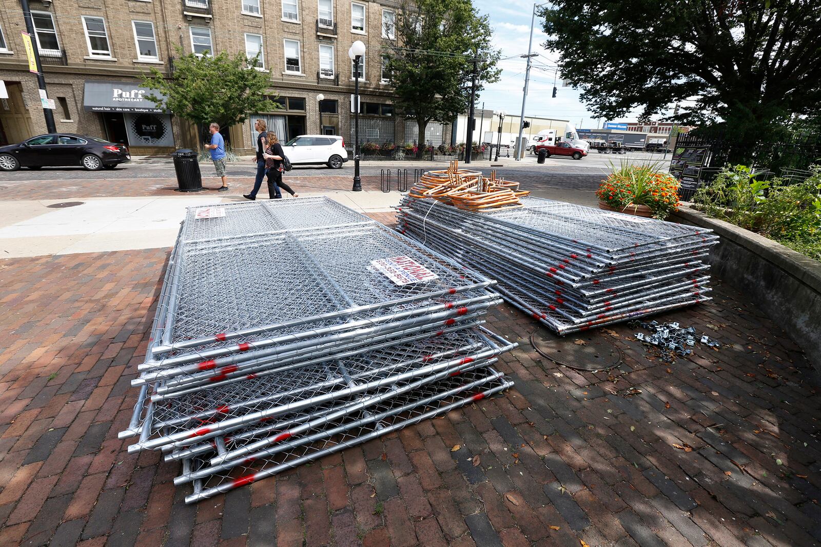 Preparations for the Gem City Shine event in the Oregon District began on Friday as stage equipment and large generators were delivered to the corner of East Fifth Street and Wayne Avenue for the Sunday event. Portable restrooms and temporary fencing were also delivered throughout the neighborhood.  TY GREENLEES / STAFF