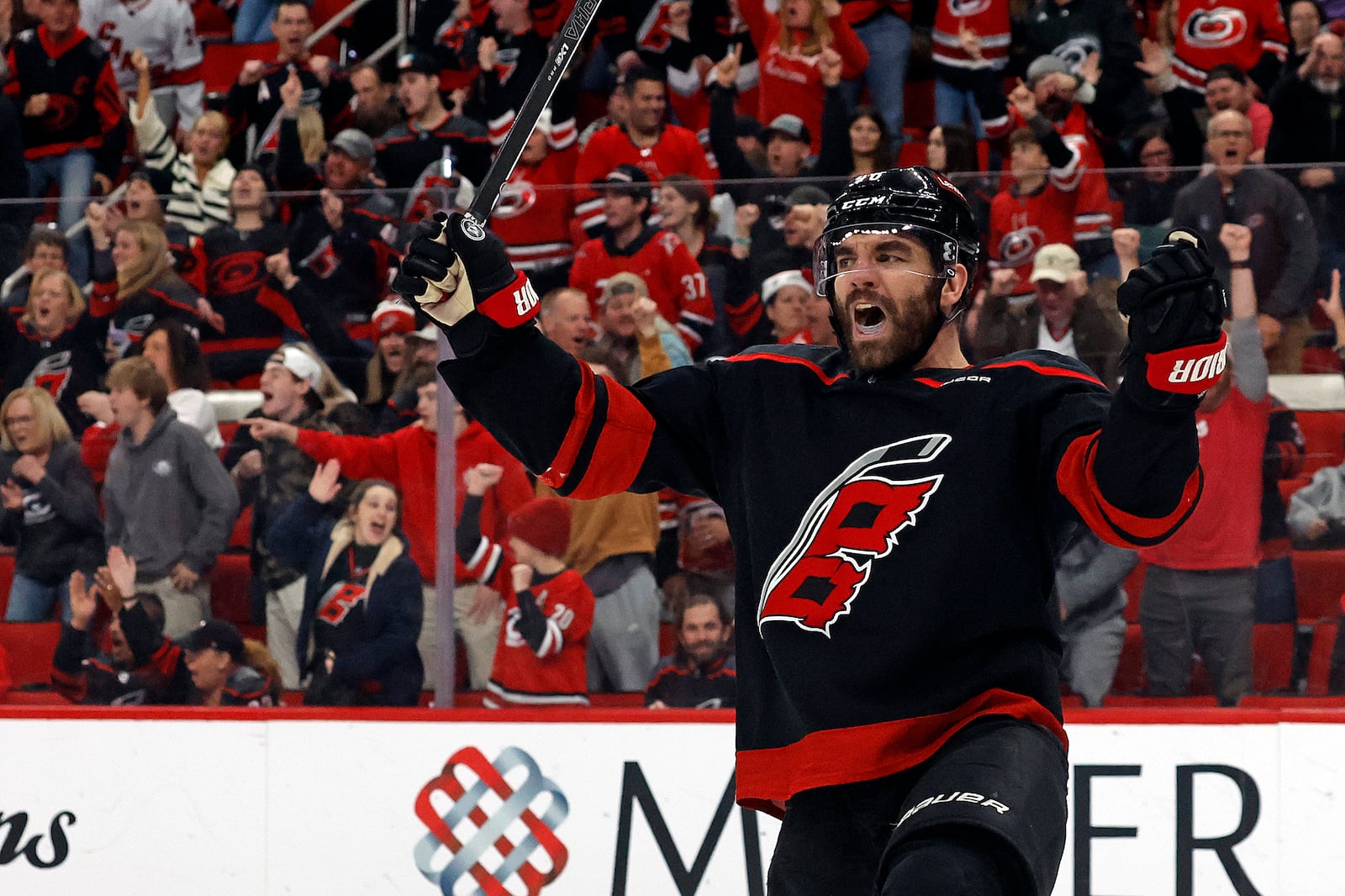 Carolina Hurricanes' Jordan Martinook (48) celebrates his goal against the Columbus Blue Jackets during the second period of an NHL hockey game in Raleigh, N.C., Sunday, Dec. 15, 2024. (AP Photo/Karl B DeBlaker)