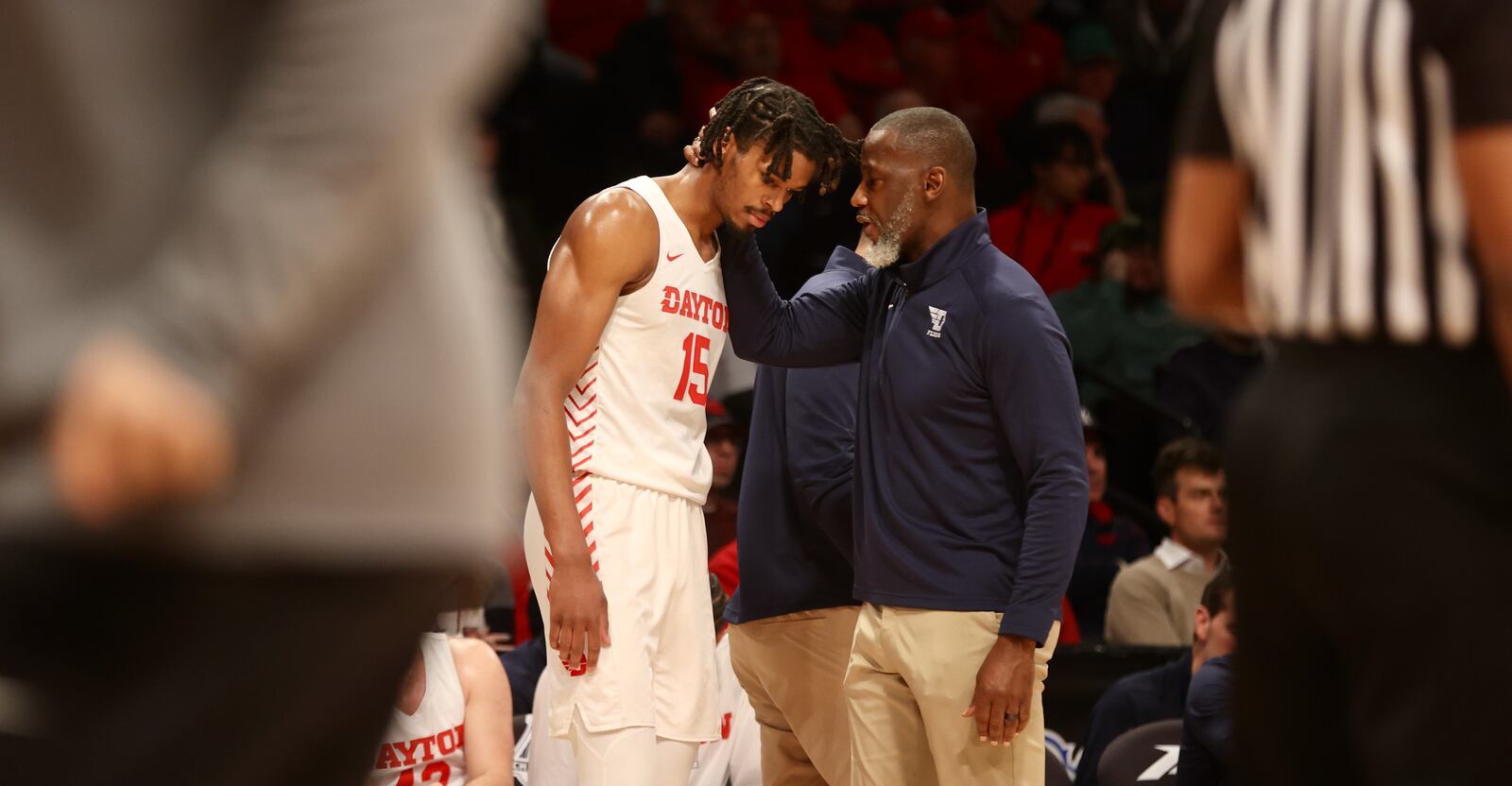 Dayton's Anthony Grant talks to DaRon Holmes II during a game against Saint Joseph’s in the quarterfinals of the Atlantic 10 Conference tournament on Thursday, March 9, 2023, at the Barclays Center in Brooklyn, N.Y. David Jablonski/Staff