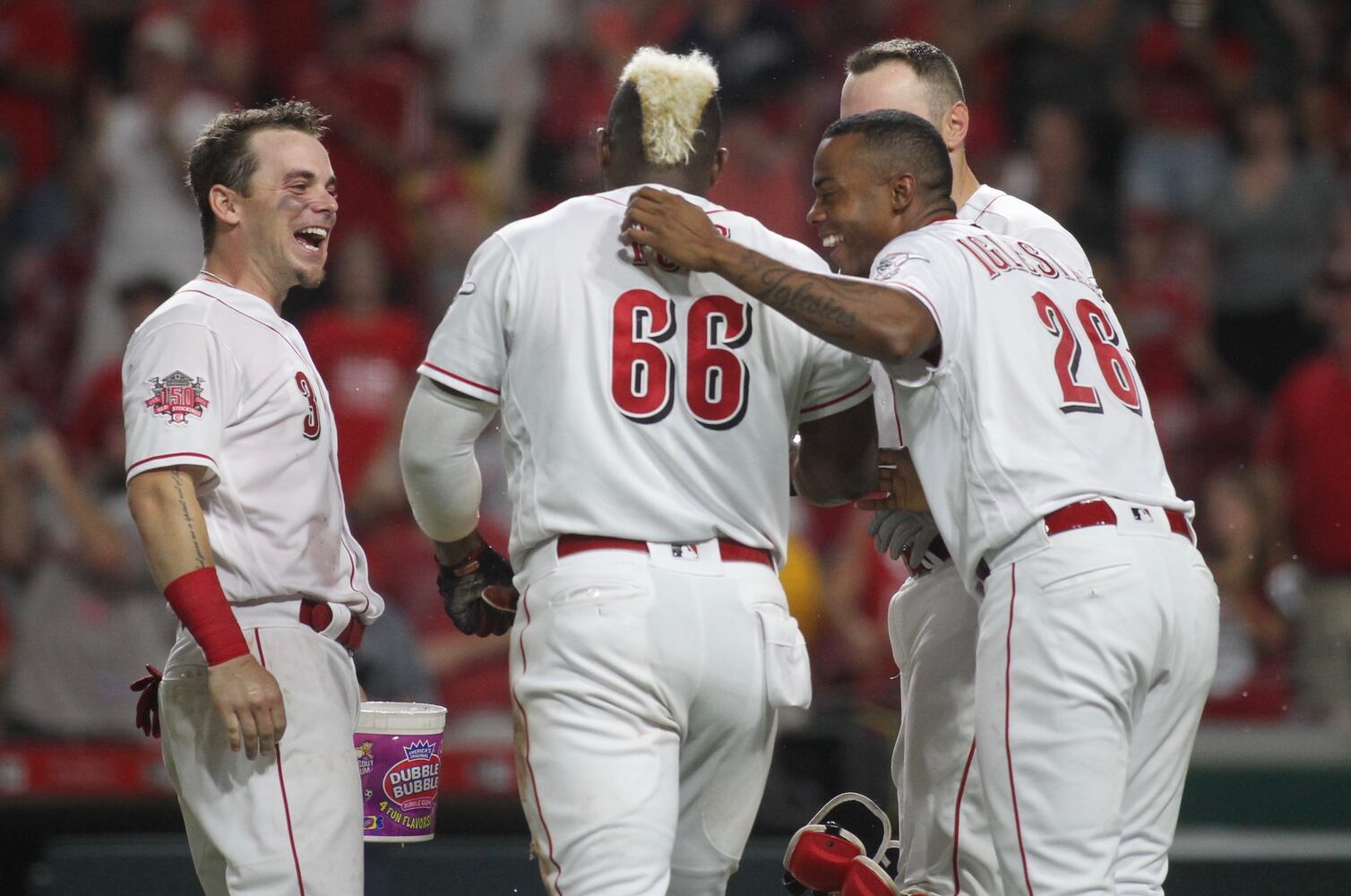 Photos: Reds beat Brewers on wild play in 11th