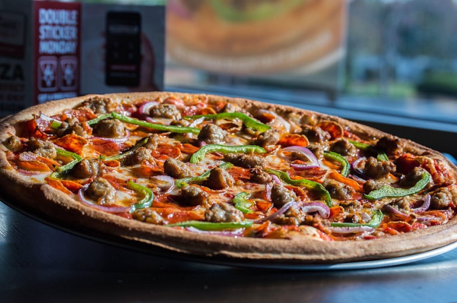 Rapid Fired Pizza is launching 14-inch family-sized pies in response to customer demand. CONTRIBUTED