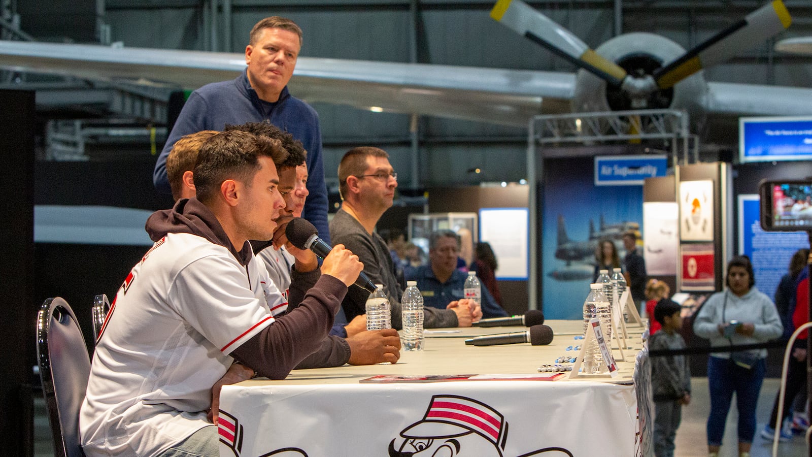 Reds infielder Alejo Lopez speaks to fans at a Reds Caravan stop at the Air Force Museum. CONTRIBUTED/Jeff Gilbert